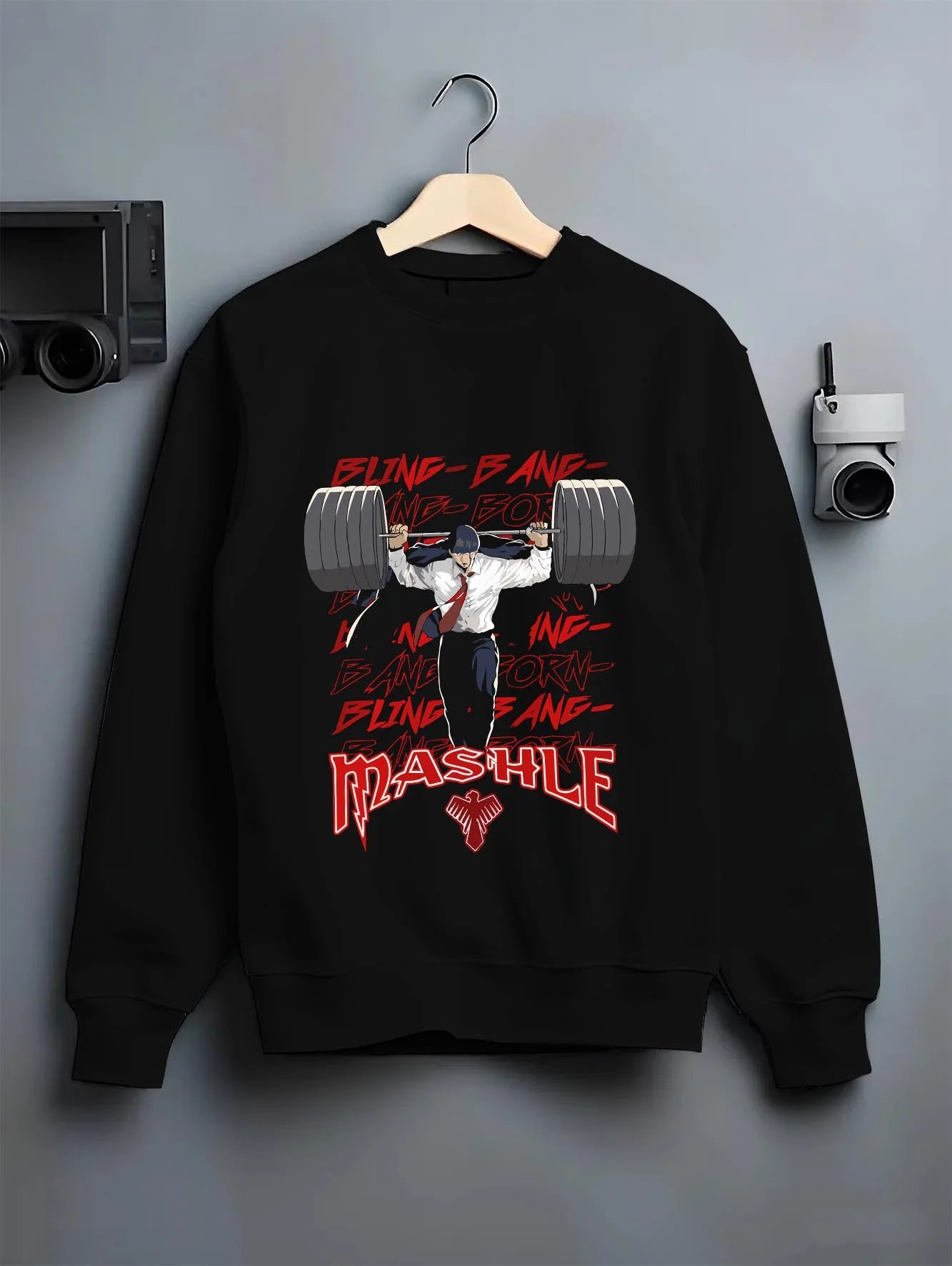 Black crewneck sweatshirt on hanger with Mash Burnedead Hoodie Mashle Muscle Weight Lift graphic streetwear graphic.