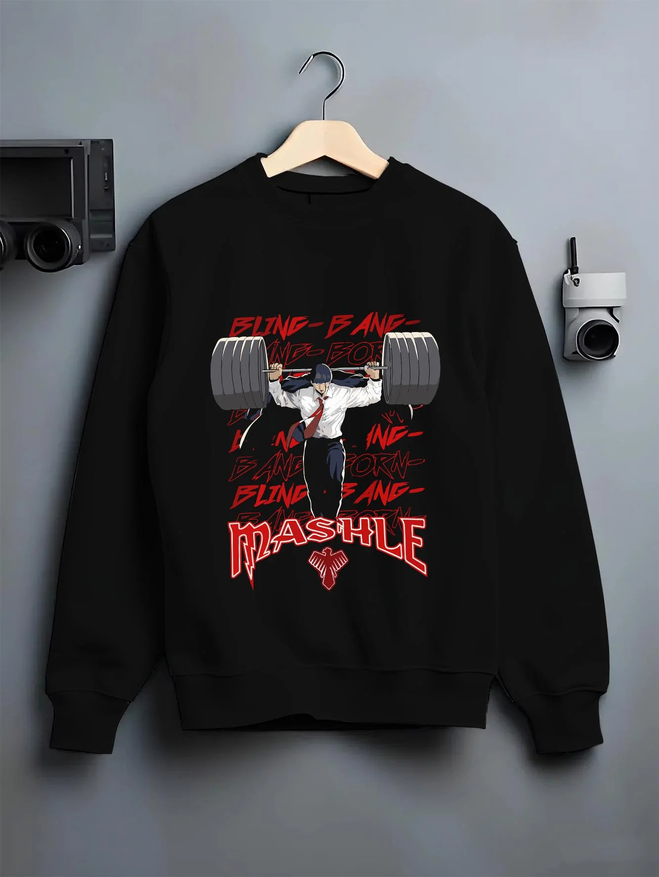 Black crewneck sweatshirt on hanger with Mash Burnedead Hoodie Mashle Muscle Weight Lift graphic streetwear graphic.