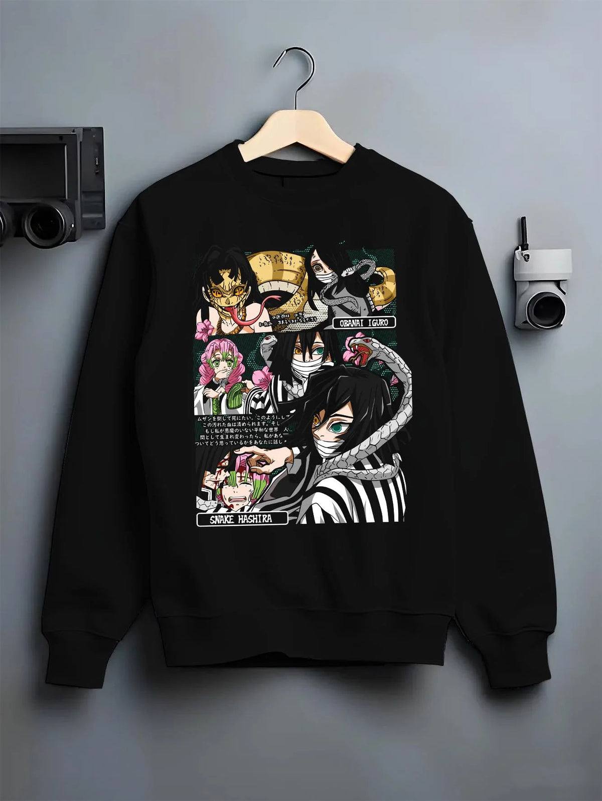 Black crewneck sweatshirt on hanger featuring Obanai Iguro Snake Hashira collage Demon Slayer artwork.
