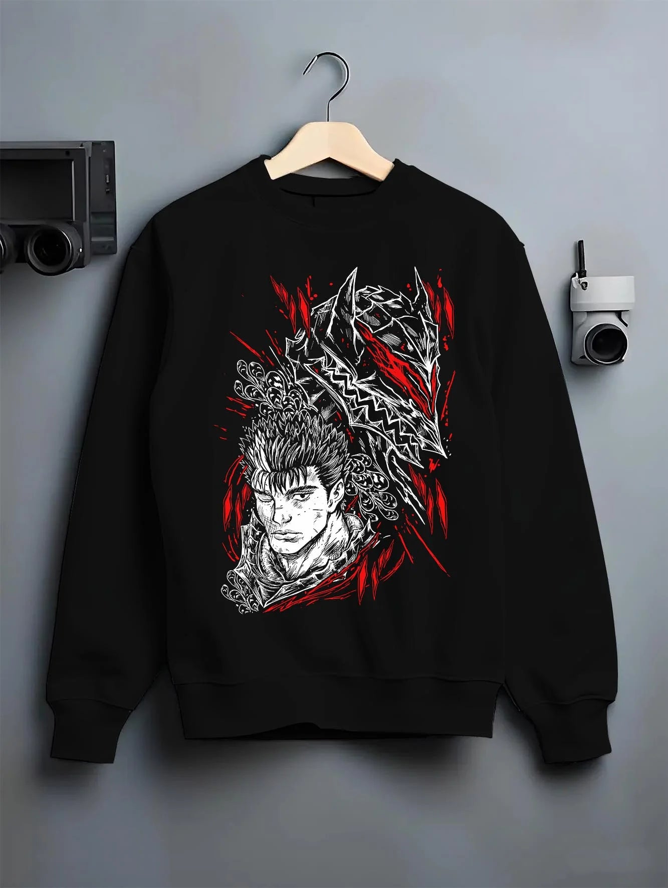 Black crewneck sweatshirt on hanger with Guts Berserk Hoodie Wolf Knight Dark Swordsman Anime graphic Guts themed artwork.