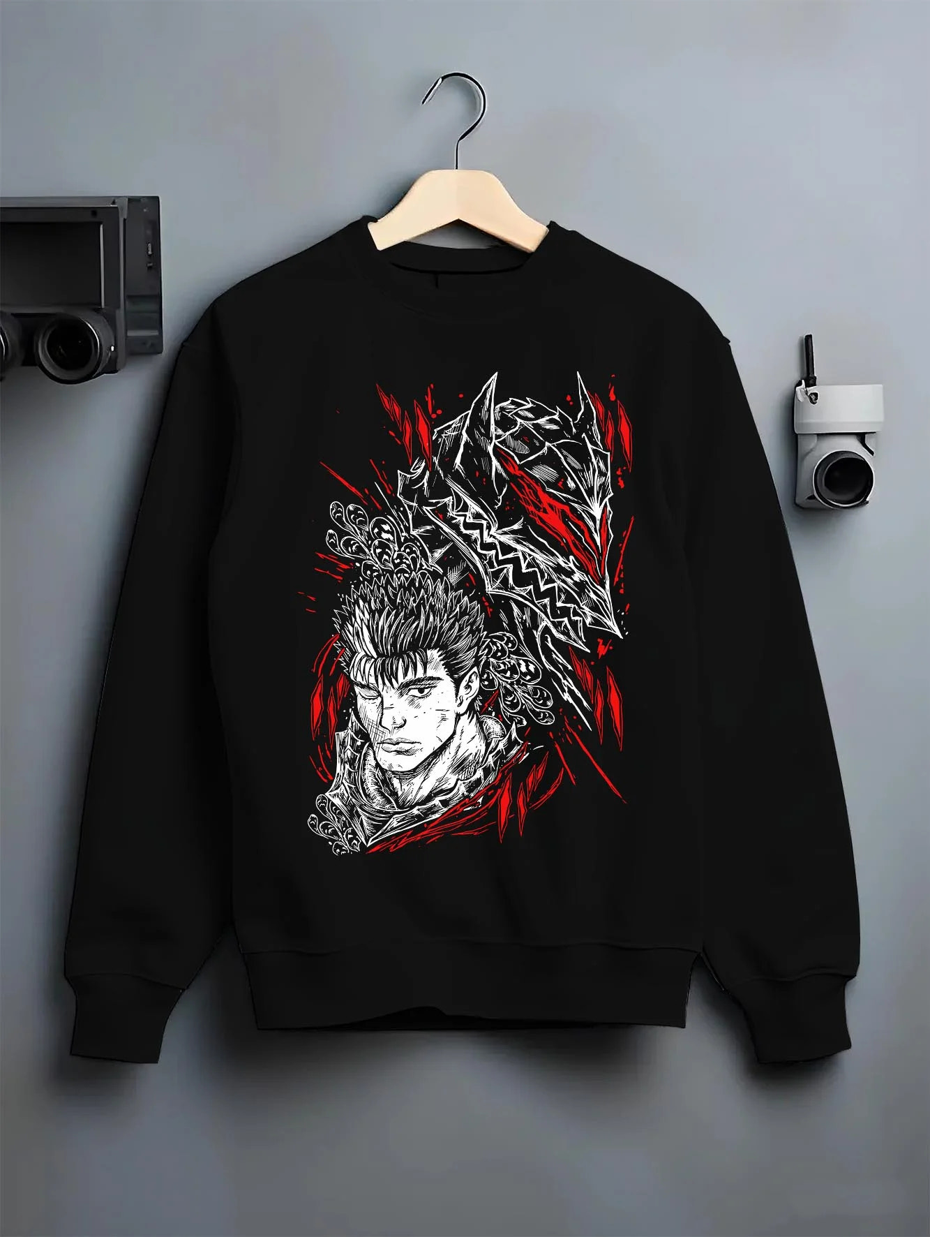 Black crewneck sweatshirt on hanger with Guts Berserk Hoodie Wolf Knight Dark Swordsman Anime graphic Guts themed artwork.