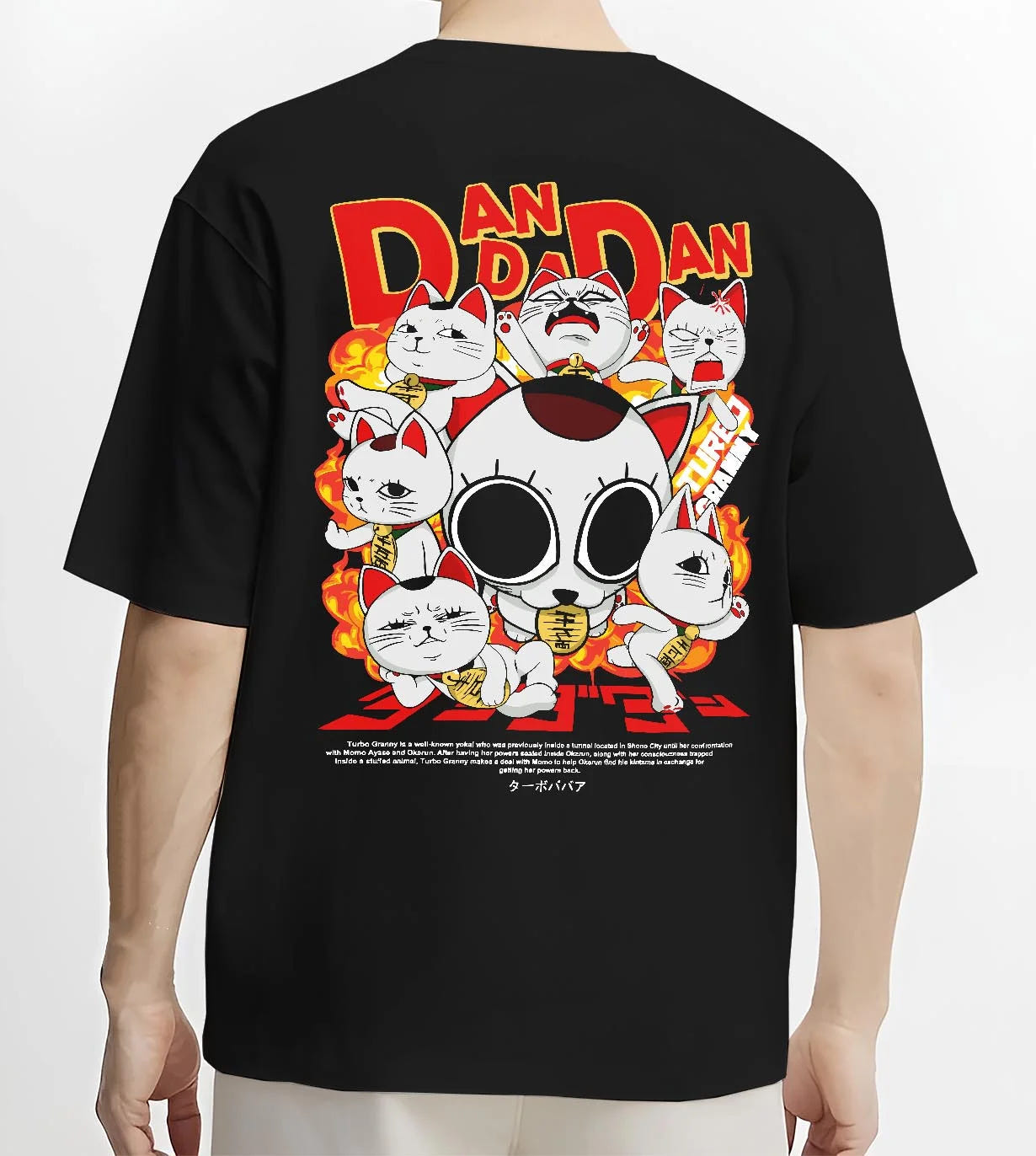 Black T-shirt worn by male model, back view with Turbo Granny Hoodie Dandadan Lucky Cat Spirit Anime graphic premium wear.