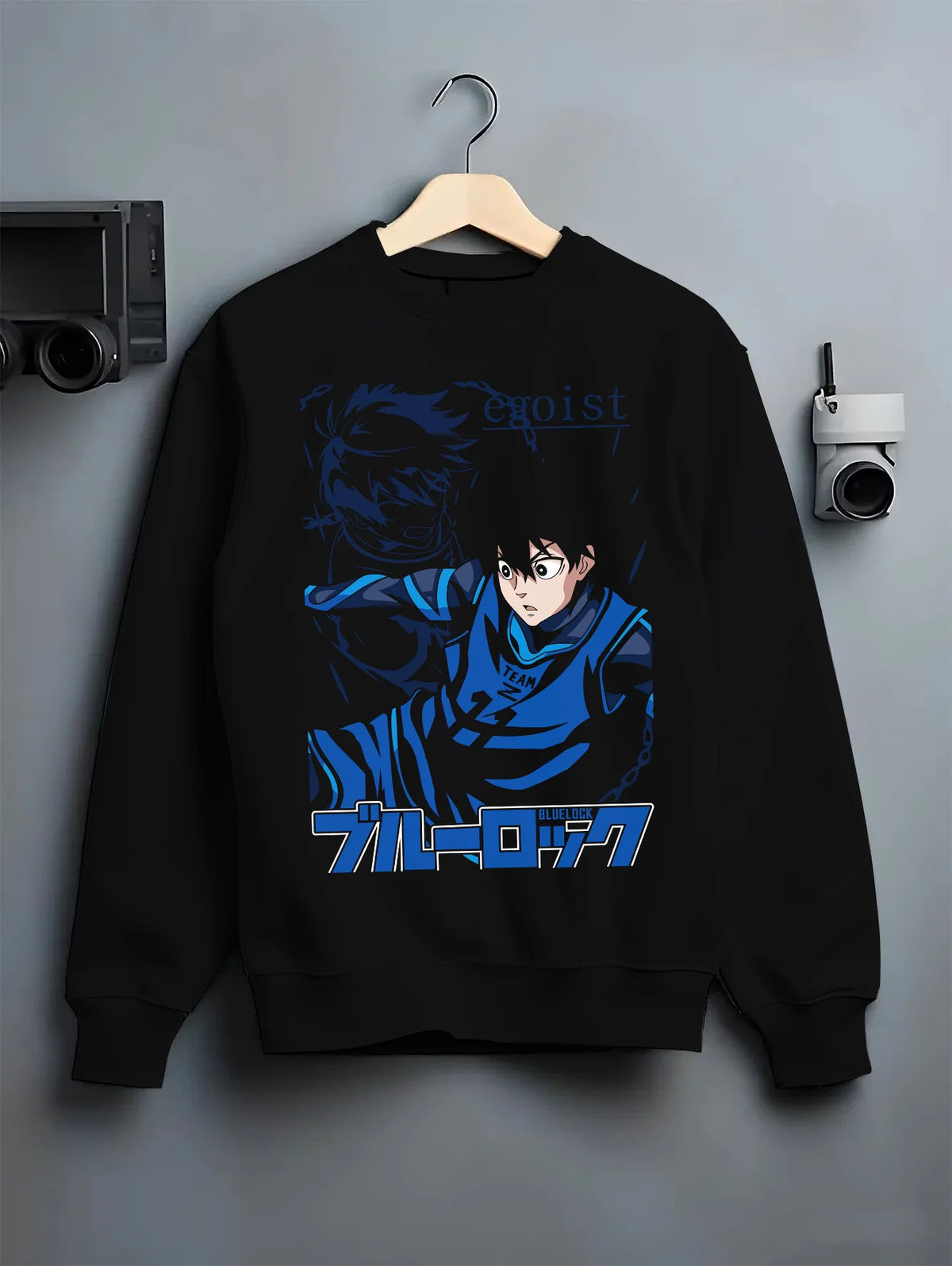 Black crewneck sweatshirt on hanger showing Yoichi Isagi from Blue Lock: Blue Lock football striker
