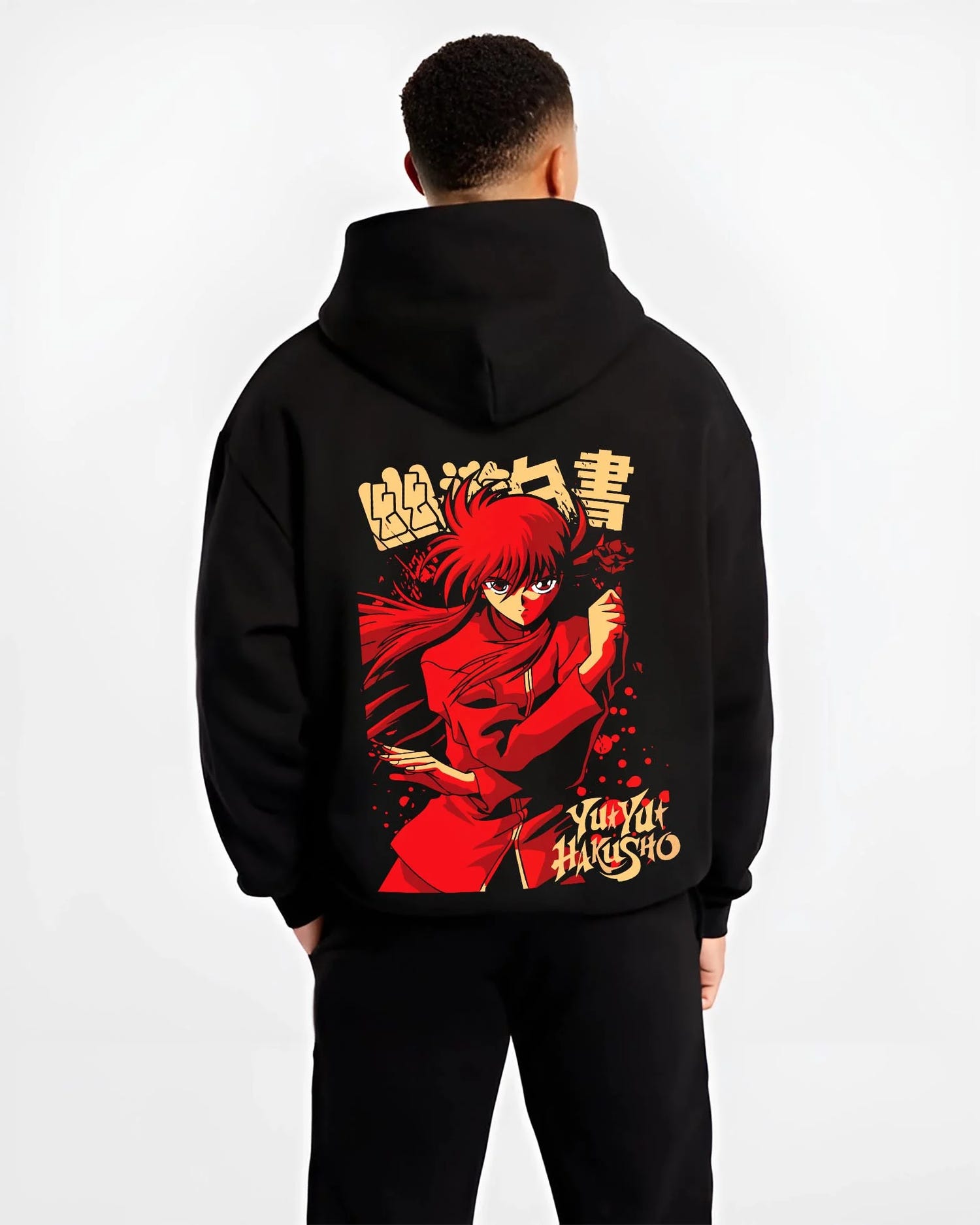 Black hoodie worn by male model, back view with Kurama Hoodie Yu Yu Hakusho Red Battle Stance graphic bold anime graphic.