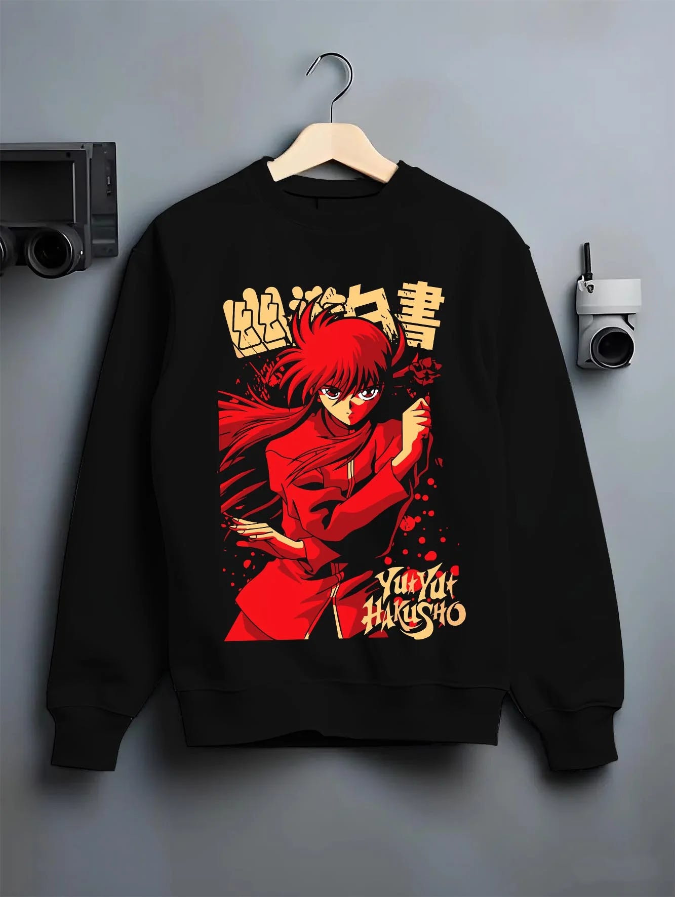 Black crewneck sweatshirt on hanger with Kurama Hoodie Yu Yu Hakusho Red Battle Stance graphic bold anime graphic.