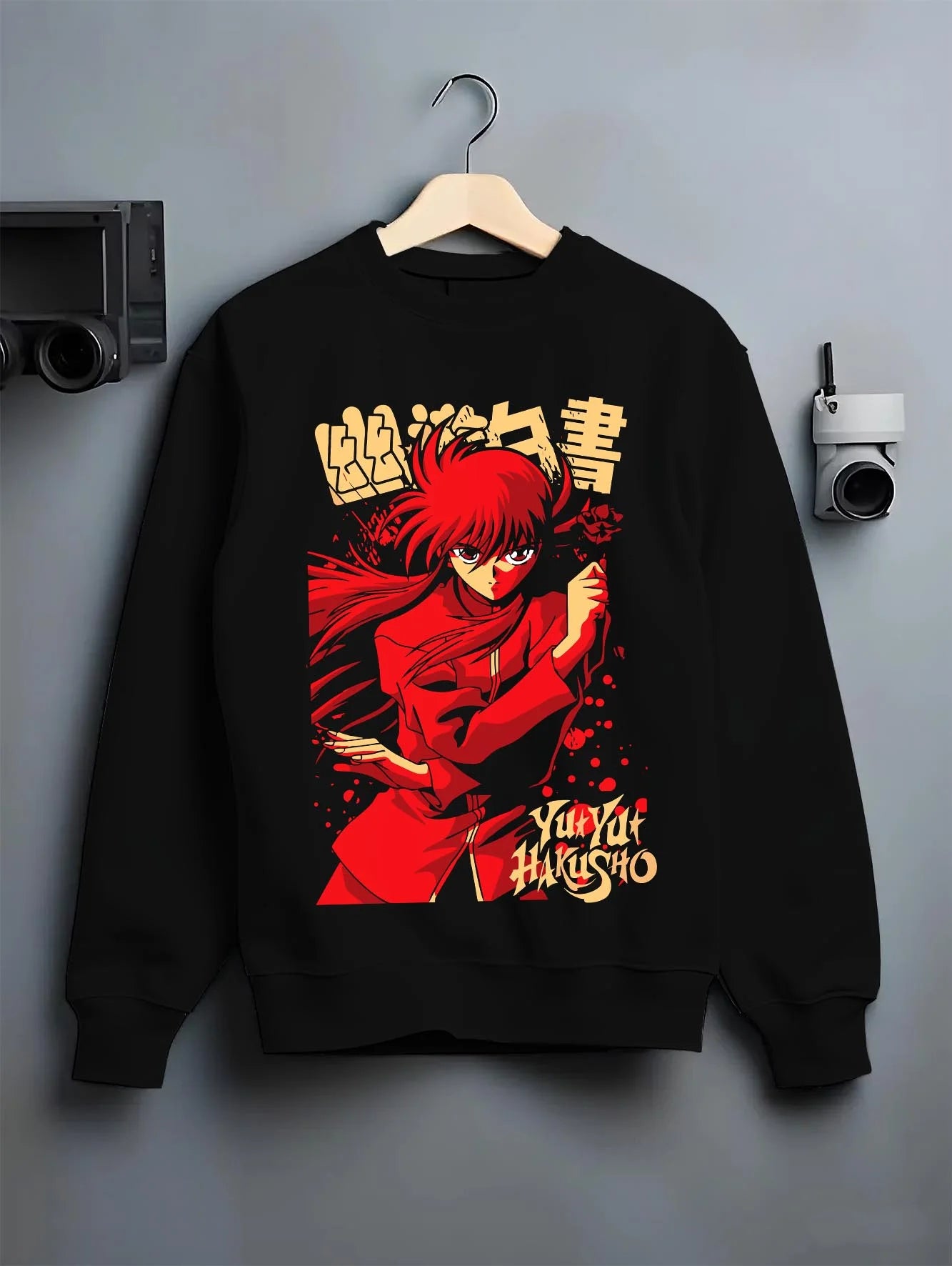 Black crewneck sweatshirt on hanger with Kurama Hoodie Yu Yu Hakusho Red Battle Stance graphic bold anime graphic.