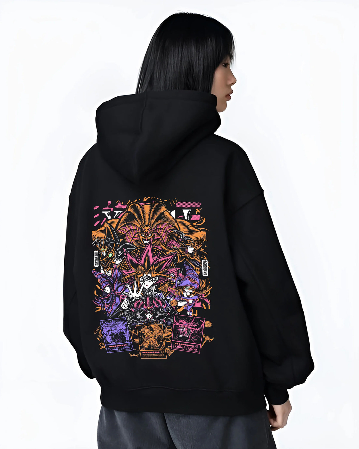 Black hoodie female model back view with Yu-Gi-Oh! monsters and duelling cards collage illustrated back graphic