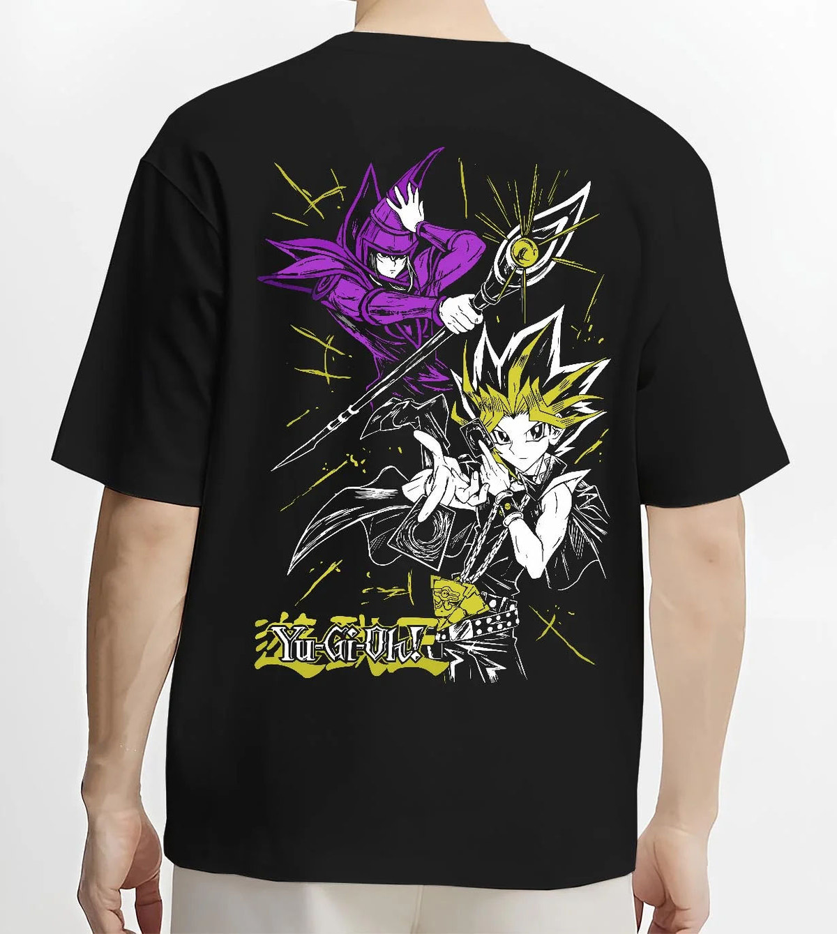 Black T-shirt worn by male model from the back featuring Yugi Millennium Puzzle King of Games Yu-Gi-Oh! artwork.