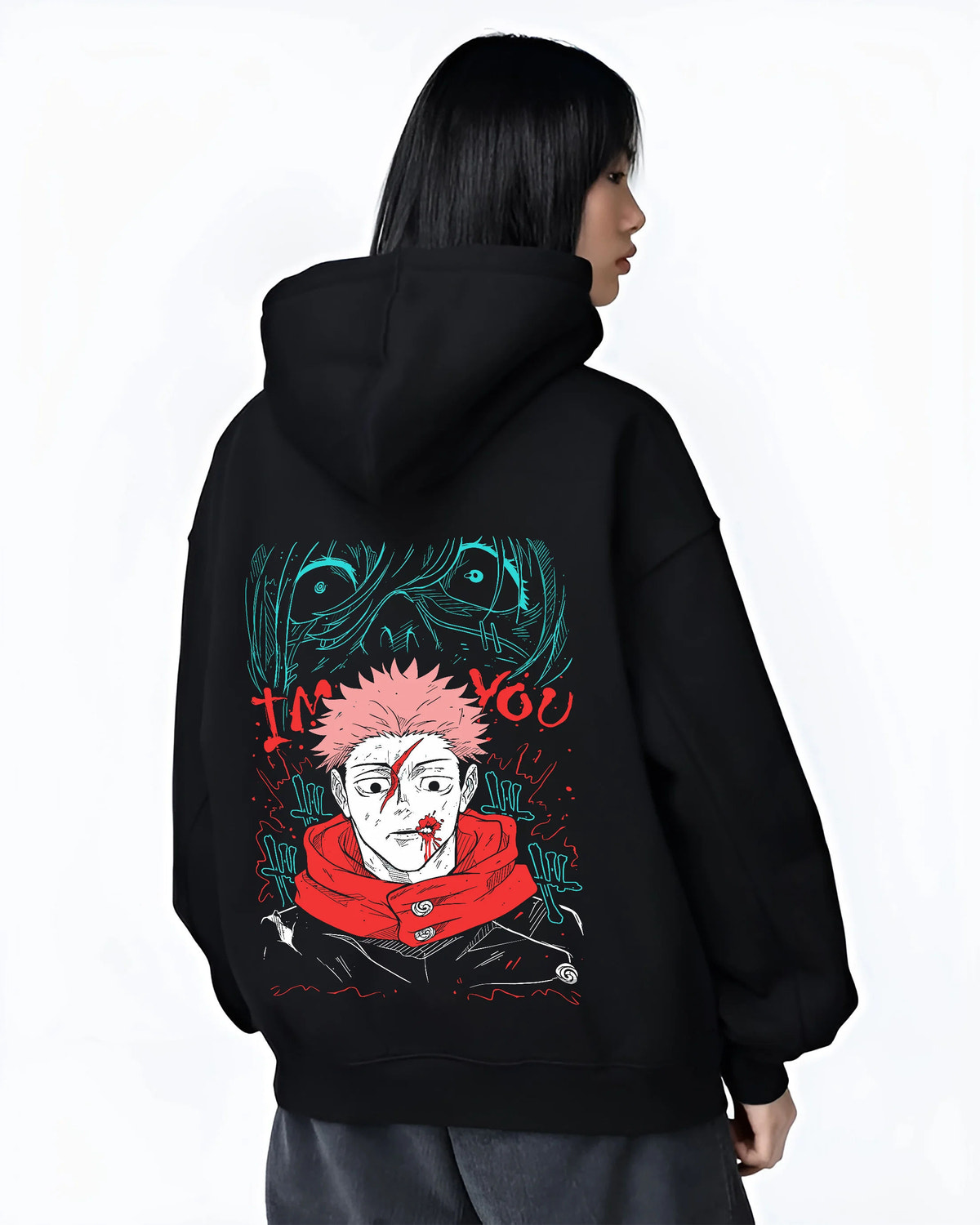 Black hoodie female model back view showing Yuji Itadori / Sukuna from Jujutsu Kaisen: scarred face red scarf artwork