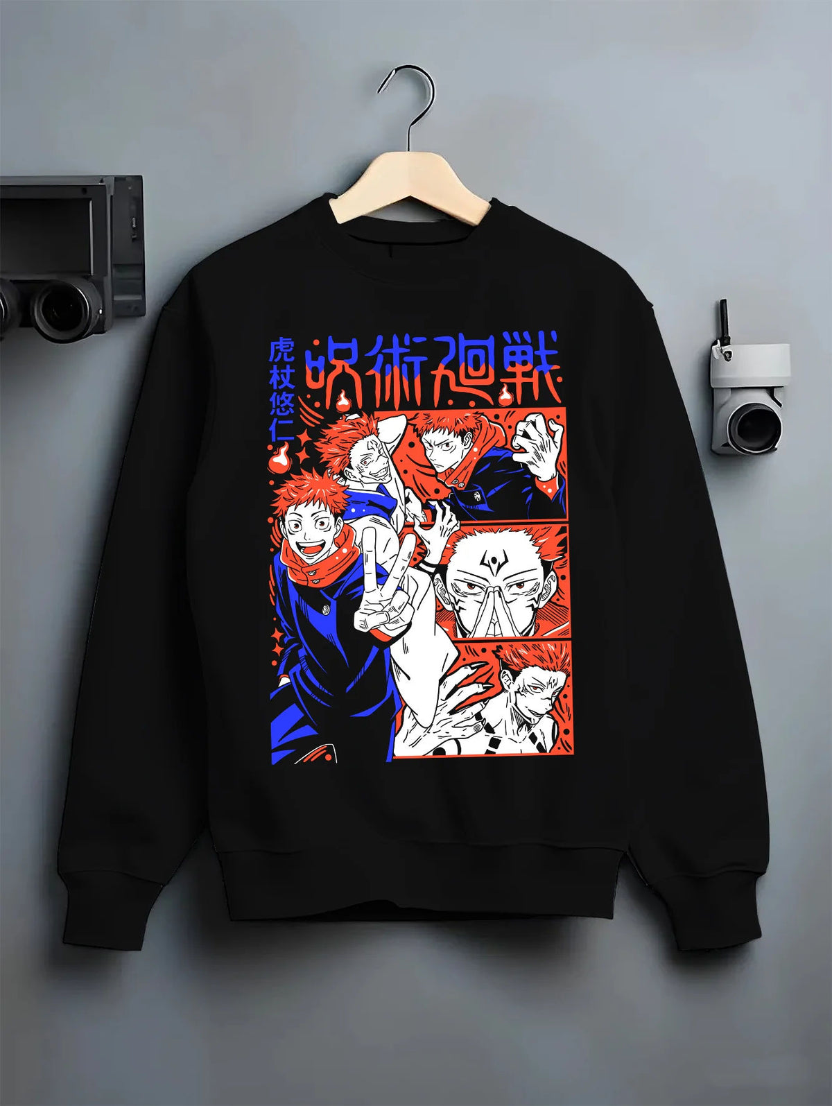 Black crewneck sweatshirt on hanger showing Yuji Itadori and Sukuna from Jujutsu Kaisen: manga montage