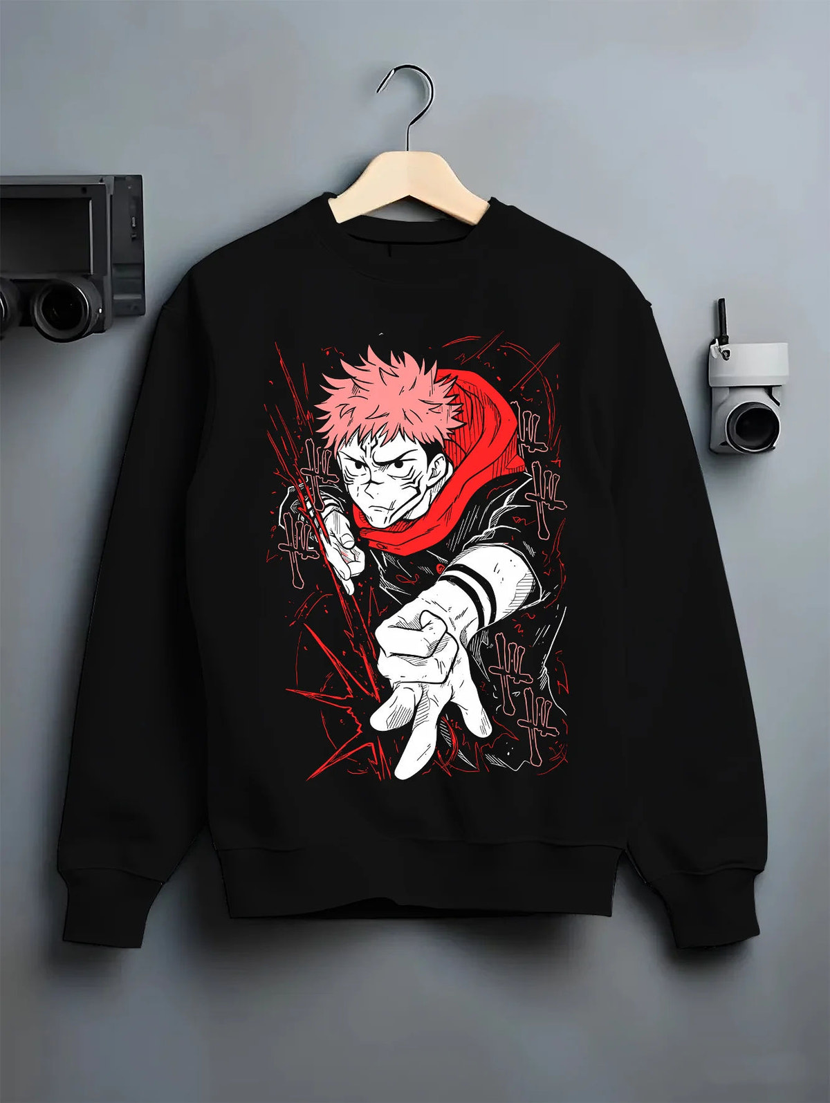 Black crewneck sweatshirt on hanger showing Yuji Itadori and Ryomen Sukuna from Jujutsu Kaisen: dual portrait