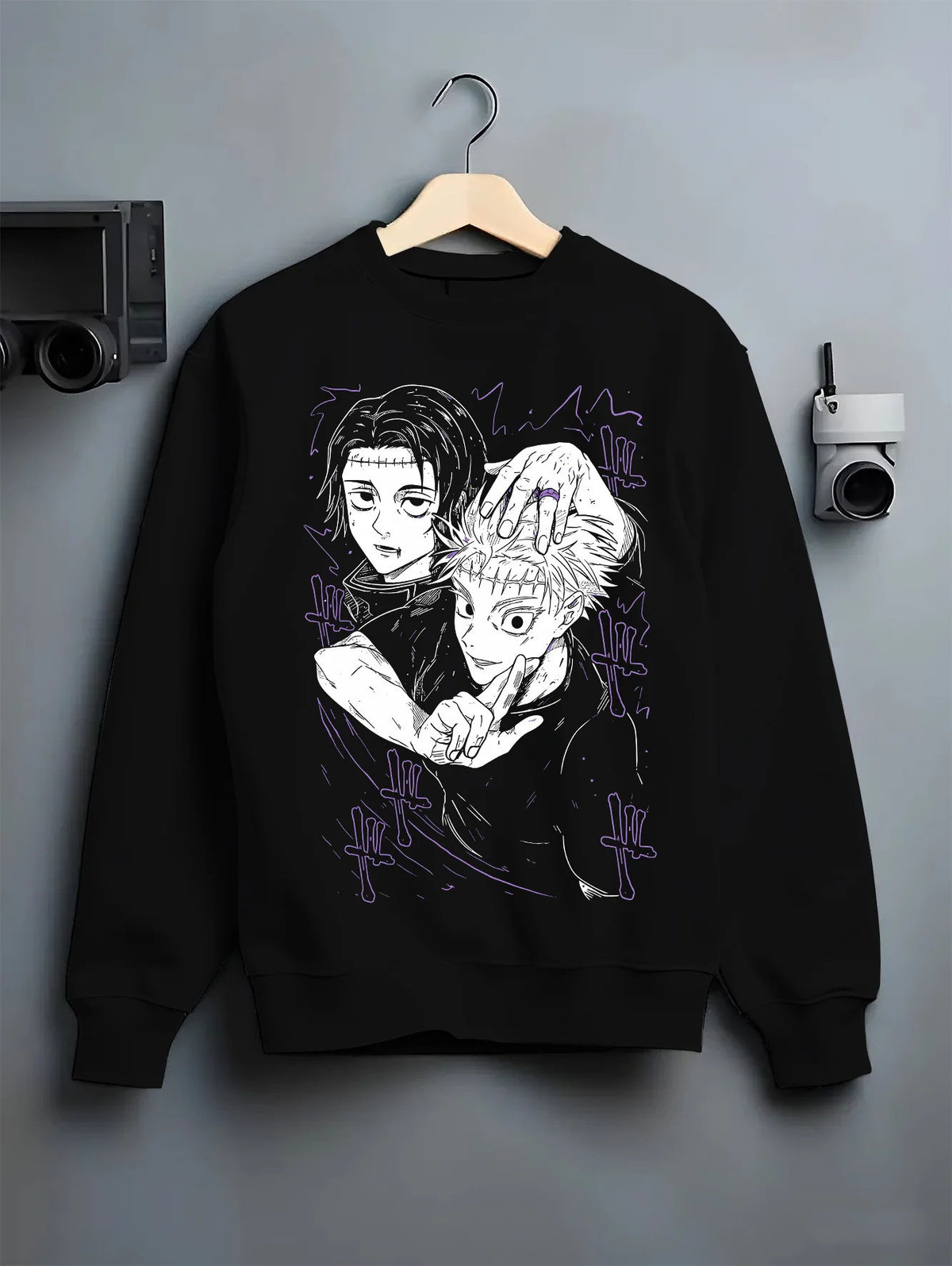 Black crewneck sweatshirt on hanger showing Yuta Okkotsu and Satoru Gojo from Jujutsu Kaisen: black-and-white manga panel