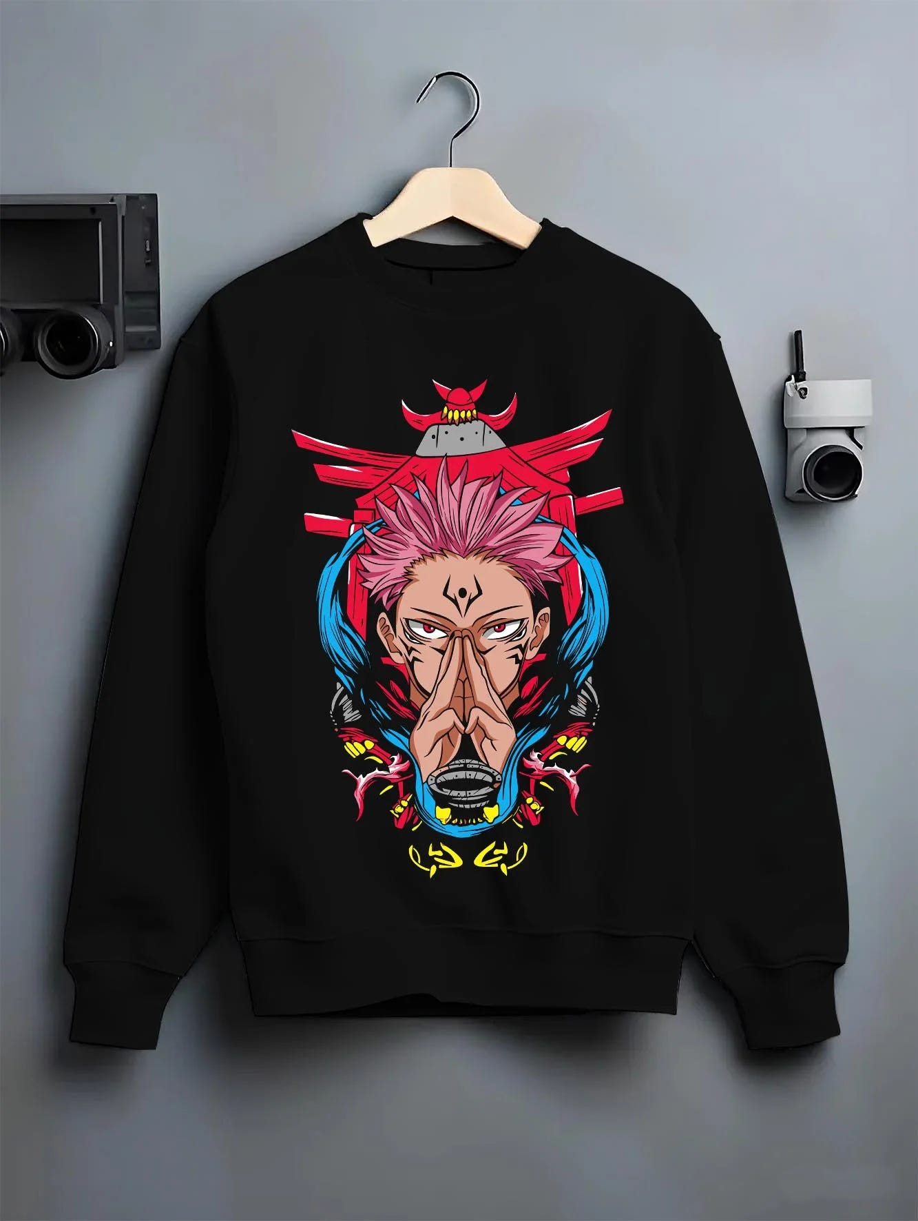 Black crewneck sweatshirt on hanger with Yuta Okkotsu Hoodie Jujutsu Kaisen Spirit Technique graphic bold anime graphic.