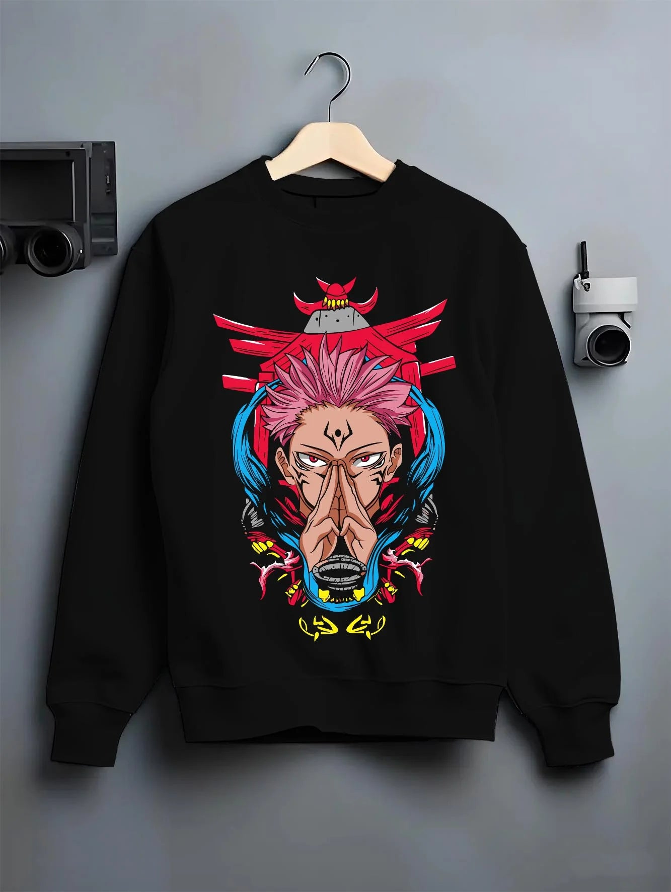 Black crewneck sweatshirt on hanger with Yuta Okkotsu Hoodie Jujutsu Kaisen Spirit Technique graphic bold anime graphic.