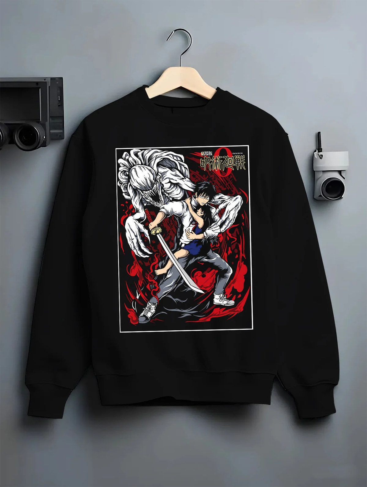 Black crewneck sweatshirt on hanger showing Yuta Okkotsu from Jujutsu Kaisen: black-and-red swordfighter design