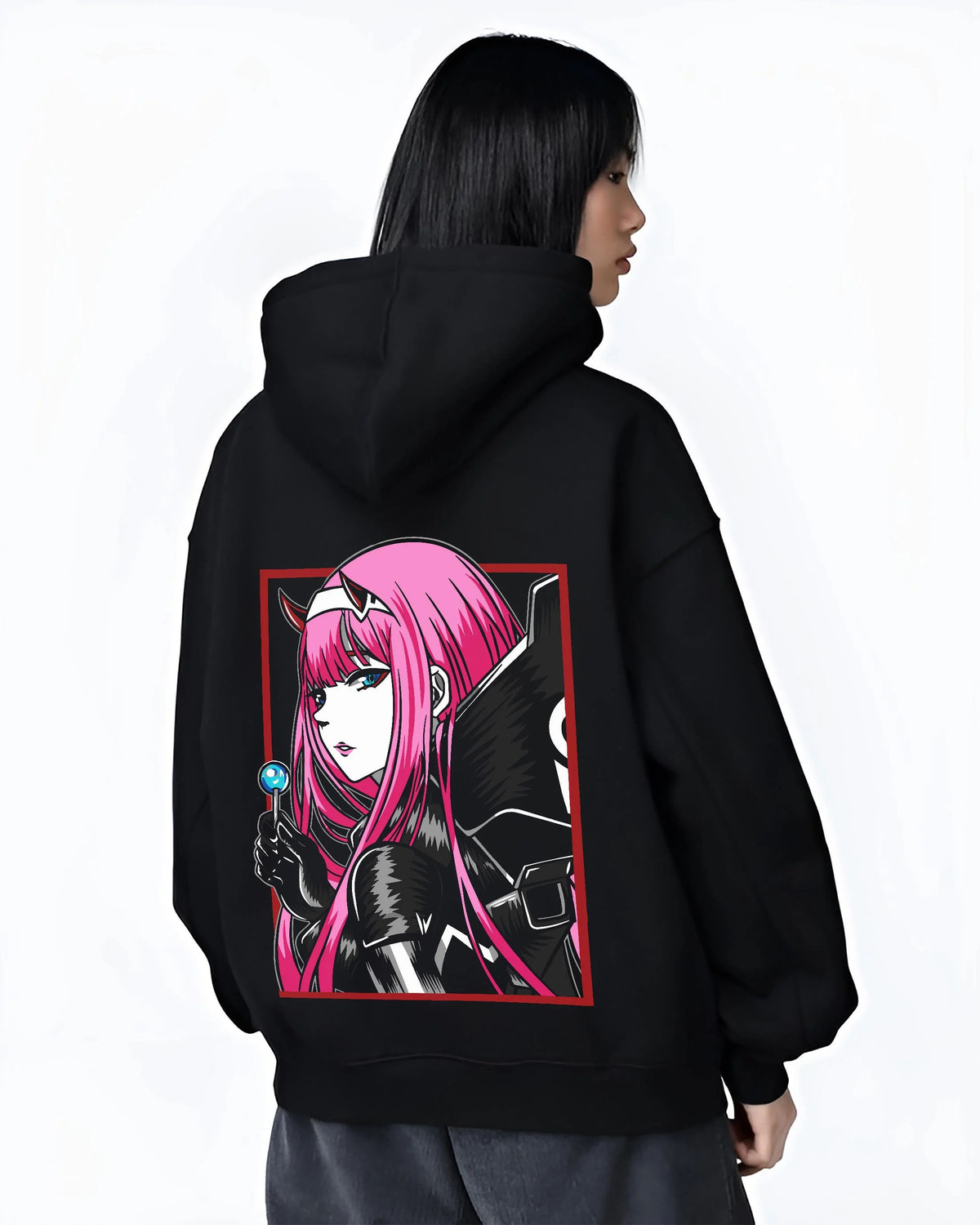 Black hoodie worn by female model from the back featuring Zero Two pink uniform portrait Darling in the Franxx artwork.