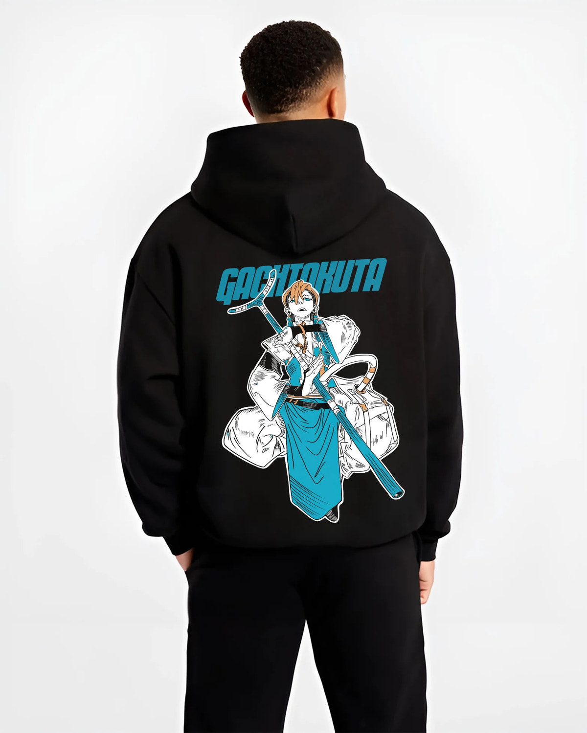 Black hoodie model back view showing Zanka Nijiku from Gachiakuta: Gachiakuta character with long weapon