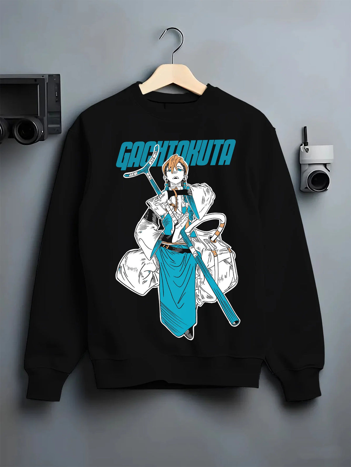 Black crewneck sweatshirt on hanger showing Zanka Nijiku from Gachiakuta: Gachiakuta character with long weapon