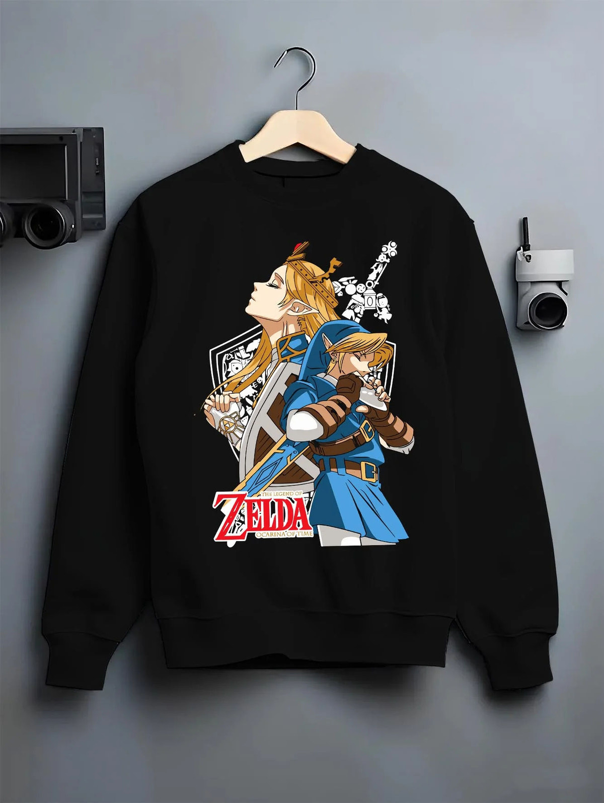 Black crewneck sweatshirt on hanger featuring Link Hylian Crest Master Sword The Legend of Zelda artwork.