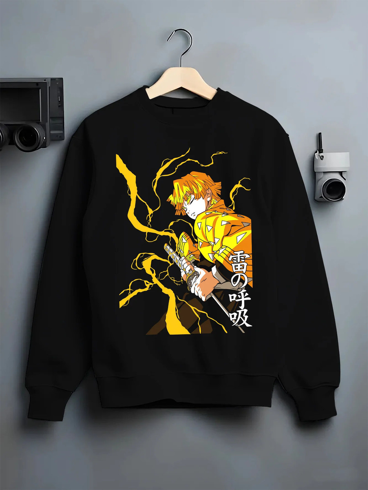 Black crewneck sweatshirt on hanger showing Zenitsu Agatsuma from Demon Slayer: lightning katana pose
