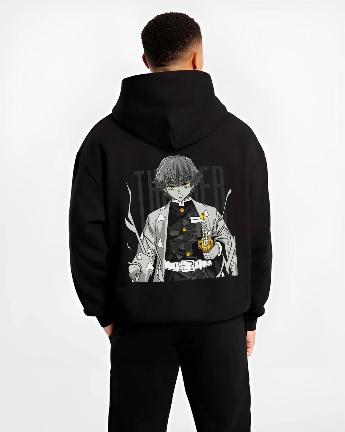 Black hoodie worn by male model from the back featuring Zenitsu Agatsuma sleeping swordsman Demon Slayer artwork.