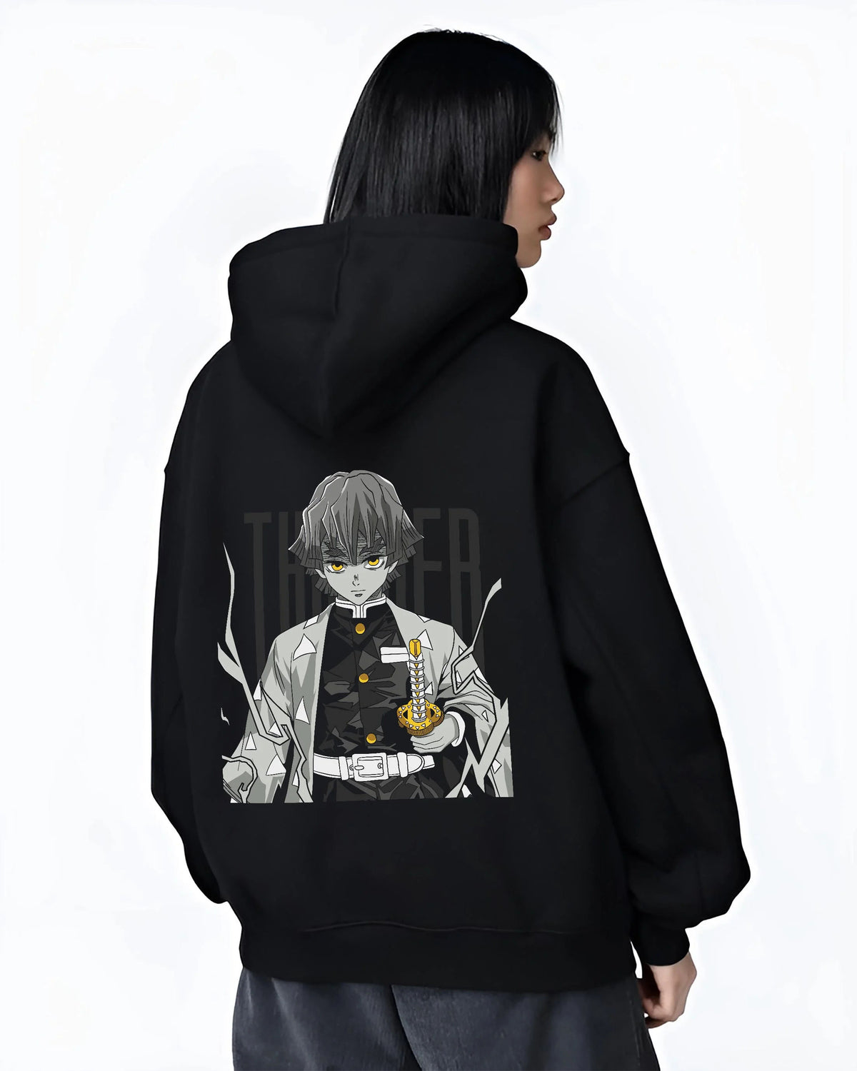Black hoodie worn by female model from the back featuring Zenitsu Agatsuma sleeping swordsman Demon Slayer artwork.