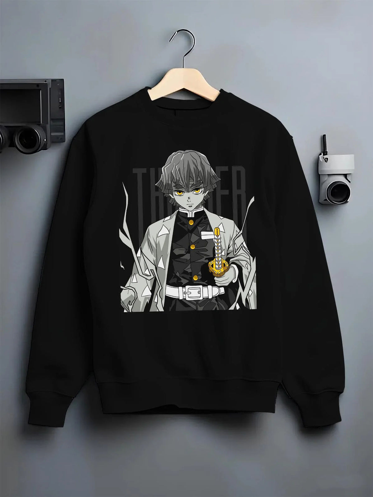 Black crewneck sweatshirt on hanger featuring Zenitsu Agatsuma sleeping swordsman Demon Slayer artwork.
