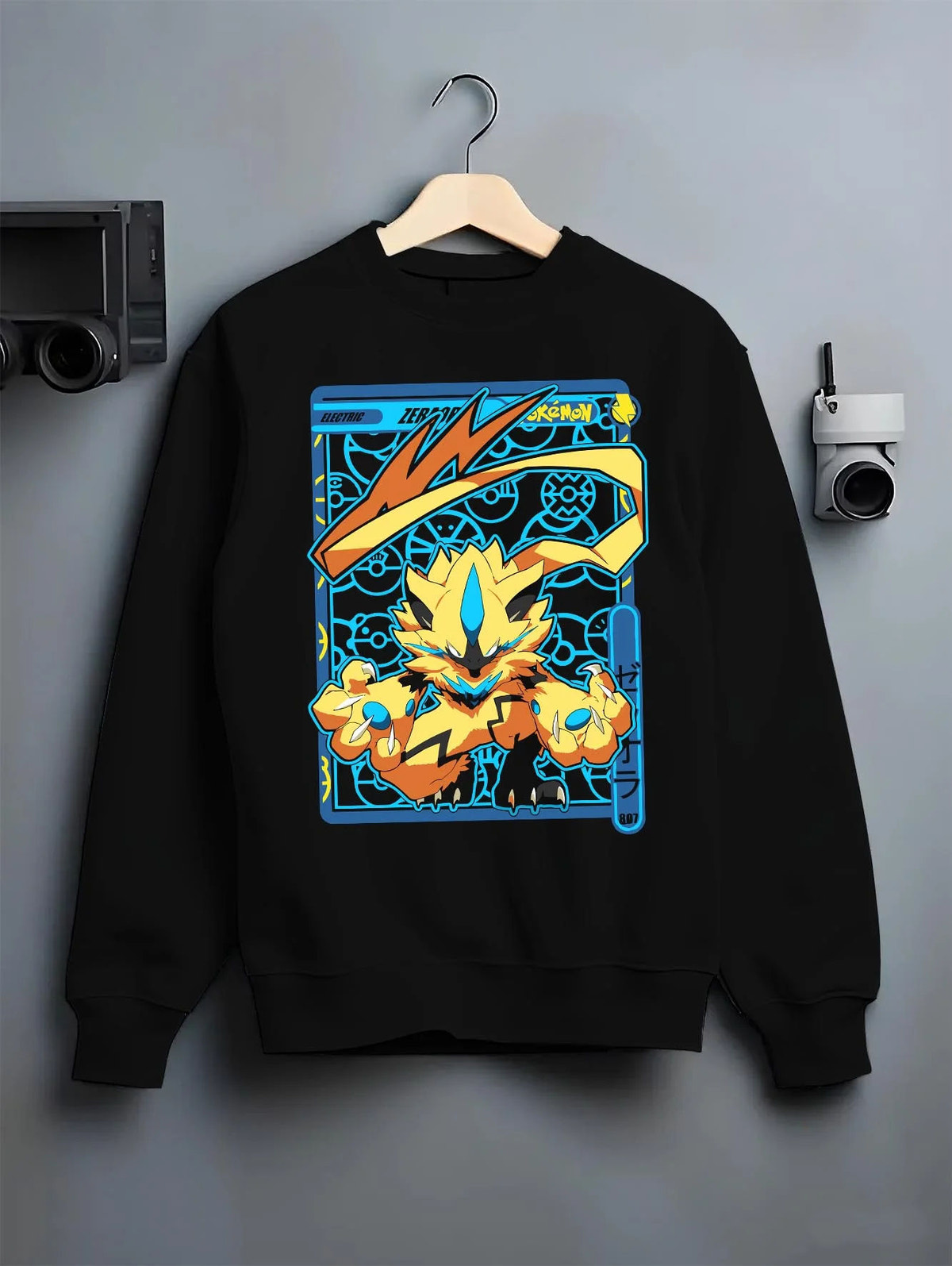 Black crewneck sweatshirt on hanger featuring Zeraora Electric Mythical Pokemon artwork.