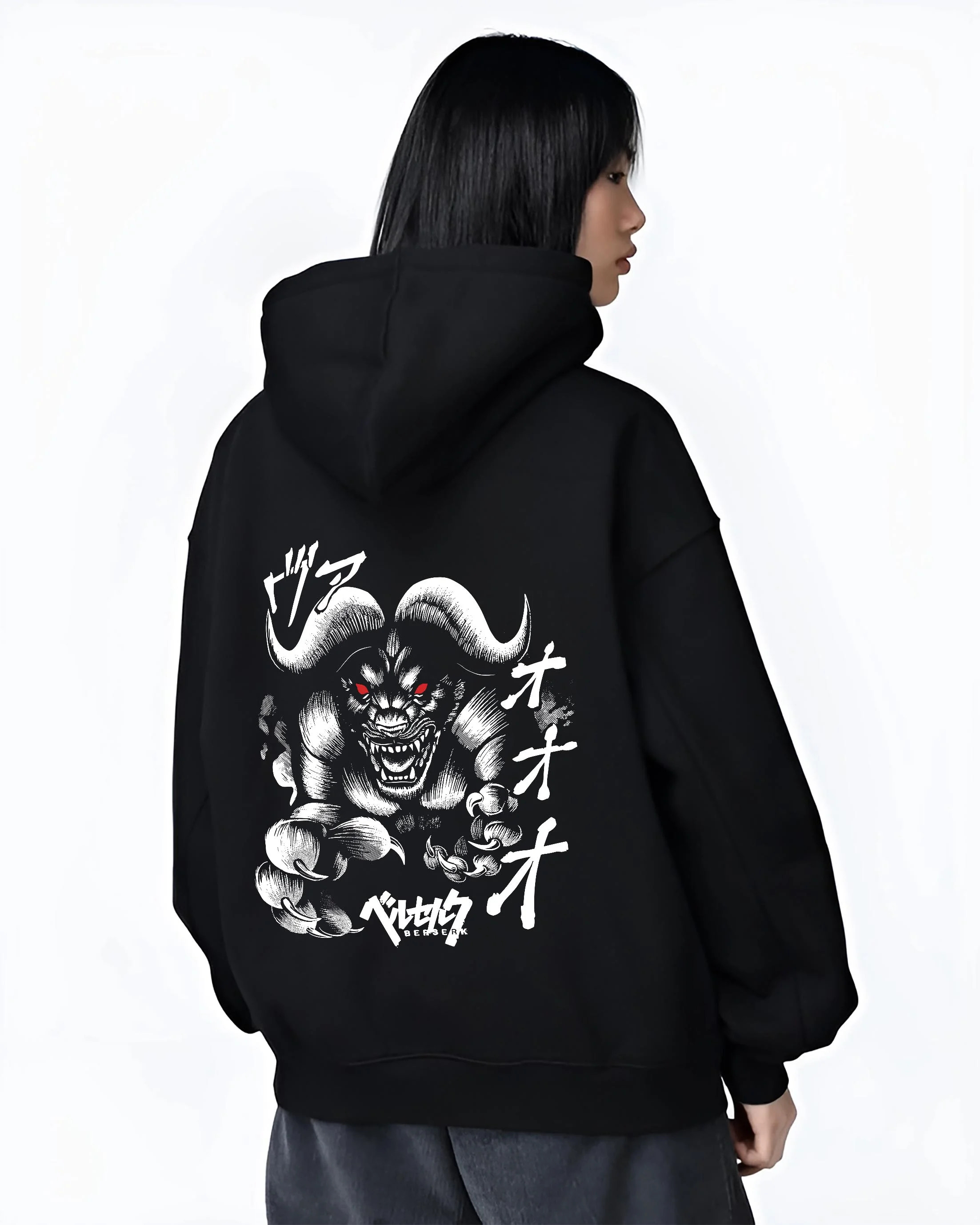 Black hoodie worn by female model, back view with Zodd Hoodie Berserk Apostle Demon Beast Swordsman graphic bold anime graphic.
