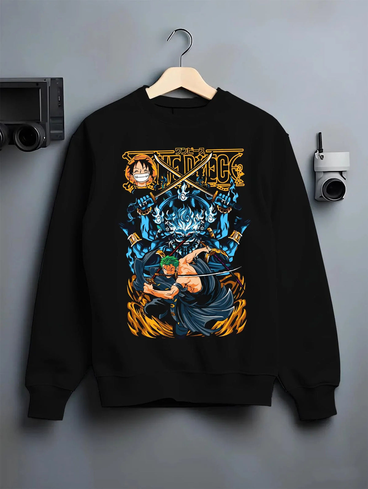 Black crewneck sweatshirt on hanger featuring Roronoa Zoro Three Sword Style One Piece artwork.