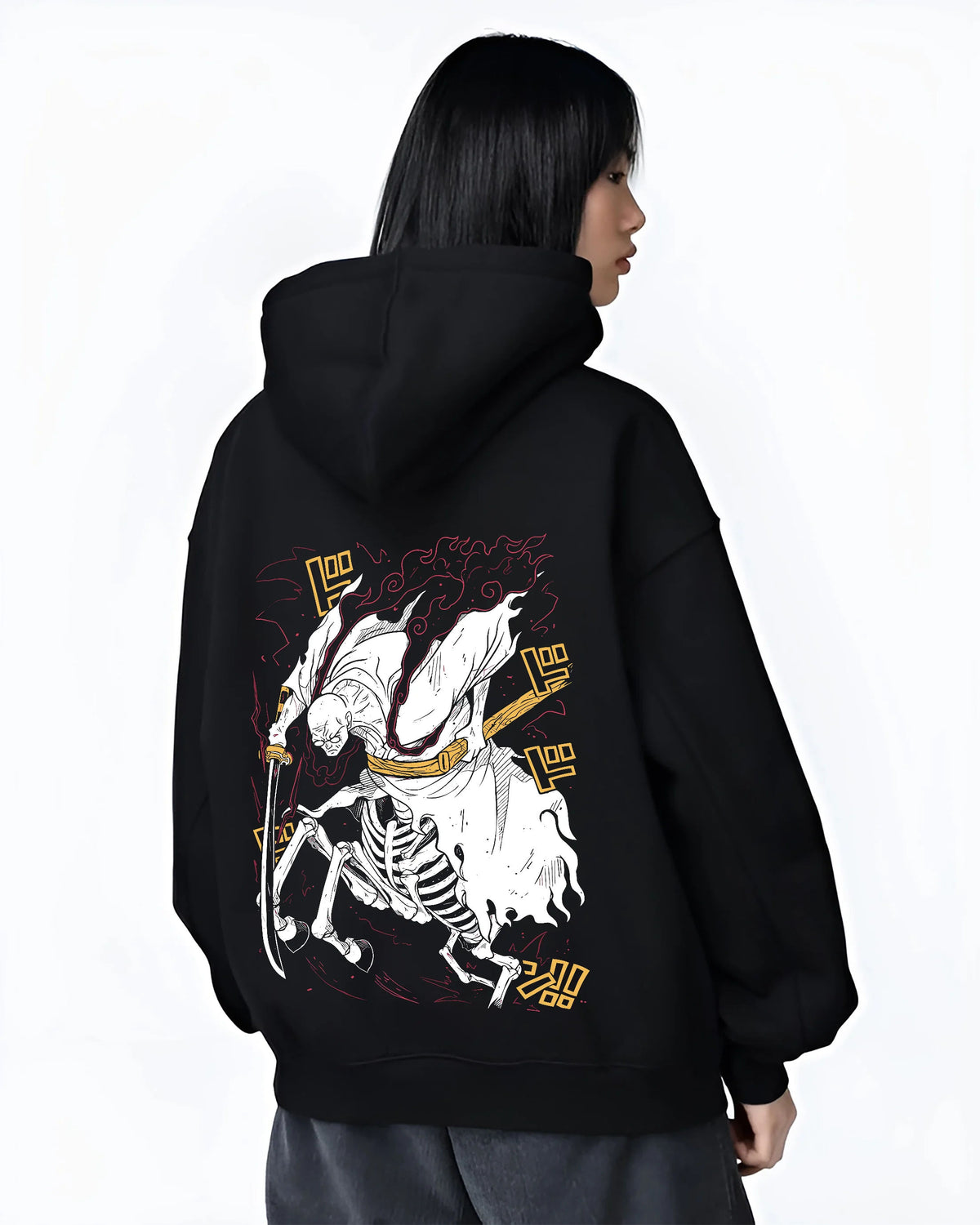 Black hoodie female model back view with Stylised skeleton swordsman with three swords from One Piece illustrated back