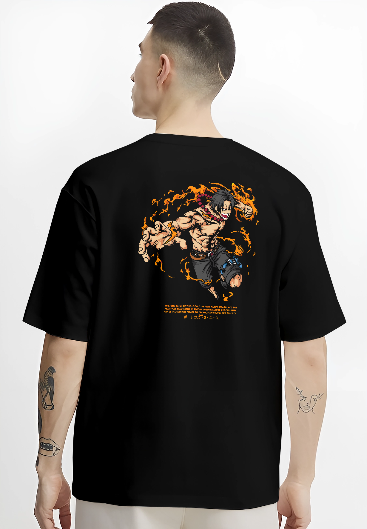 Black T-shirt worn by a male model, back view, featuring One Piece Portgas D. Ace retro manga artwork print with Japanese animation streetwear fire-inspired graphic.