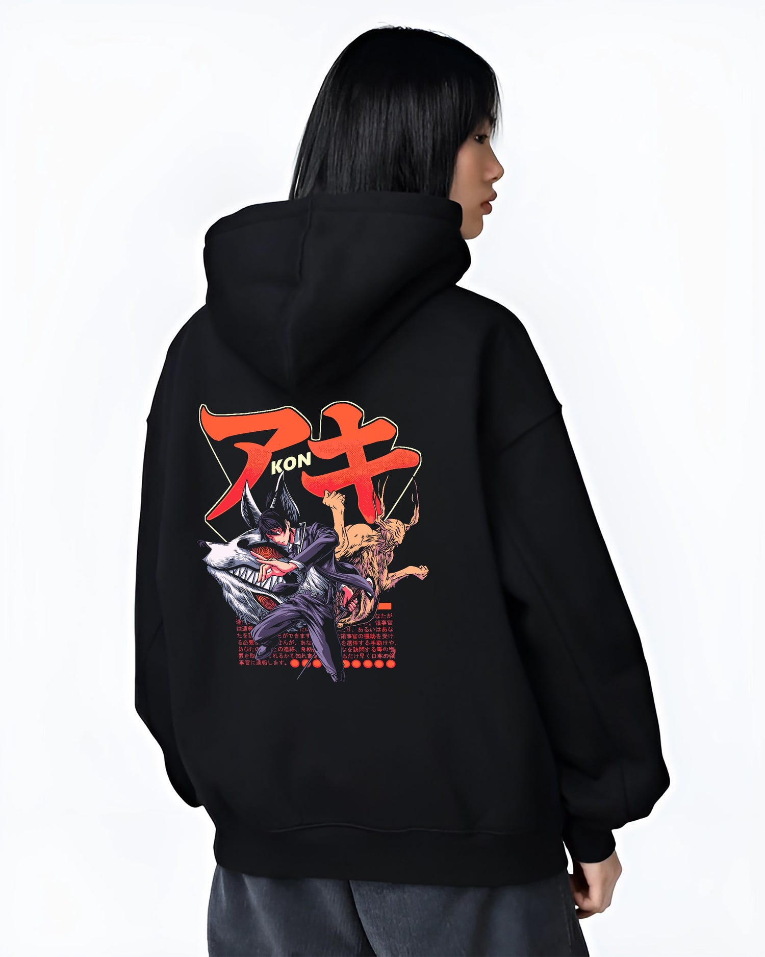 Black hoodie worn by a female model, back view, featuring Aki Chainsaw Man anime poster inspired artwork with fox devil attack in urban fashion back design.
