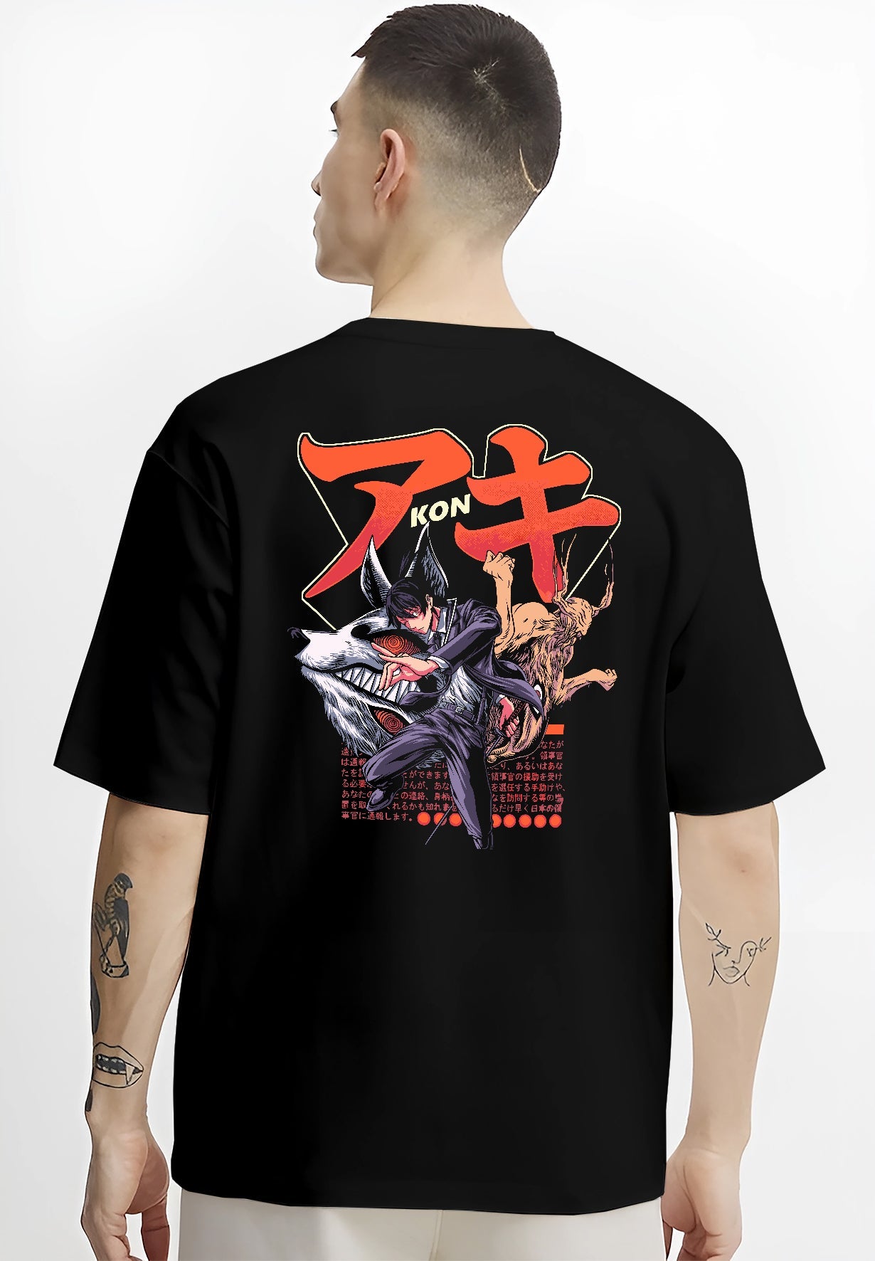 Black T-shirt worn by a male model, back view, featuring Aki Chainsaw Man dark manga panel artwork with fox devil summon in shonen battle anime detail.