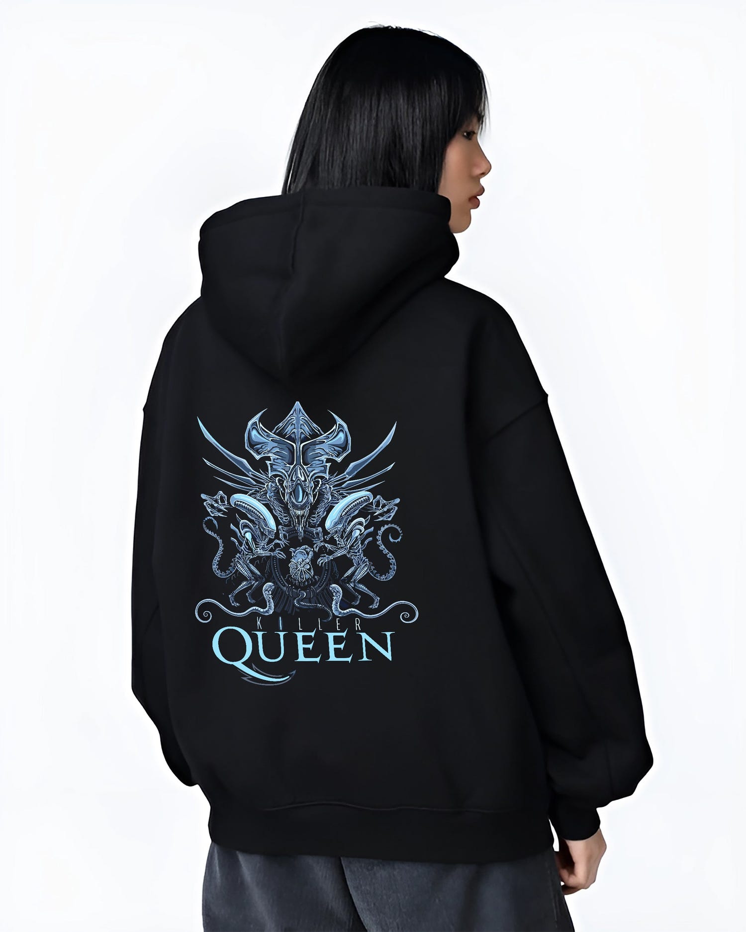 Black hoodie on female model, back view, Alien Xenomorph Queen “Killer Queen” retro sci-fi artwork with detailed biomech lines and icy blue accents.