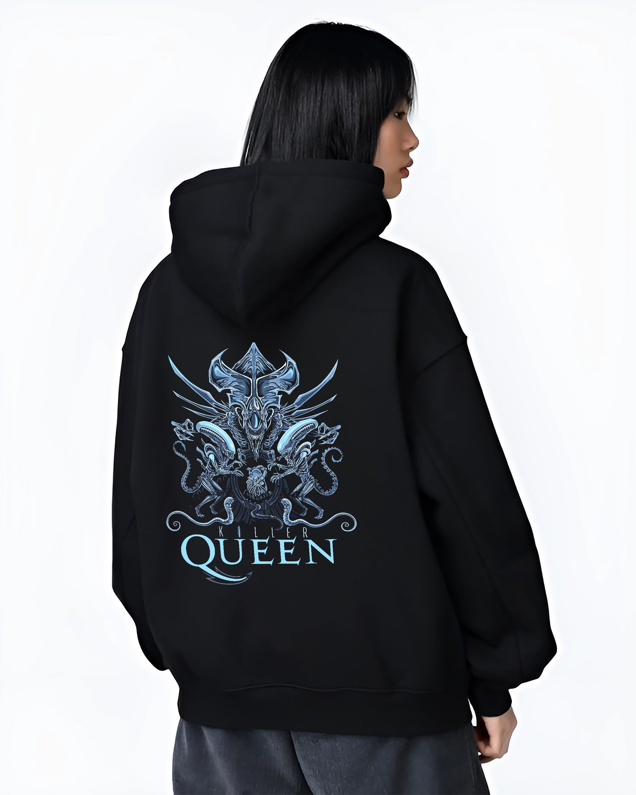Black hoodie on female model, back view, Alien Xenomorph Queen “Killer Queen” retro sci-fi artwork with detailed biomech lines and icy blue accents.