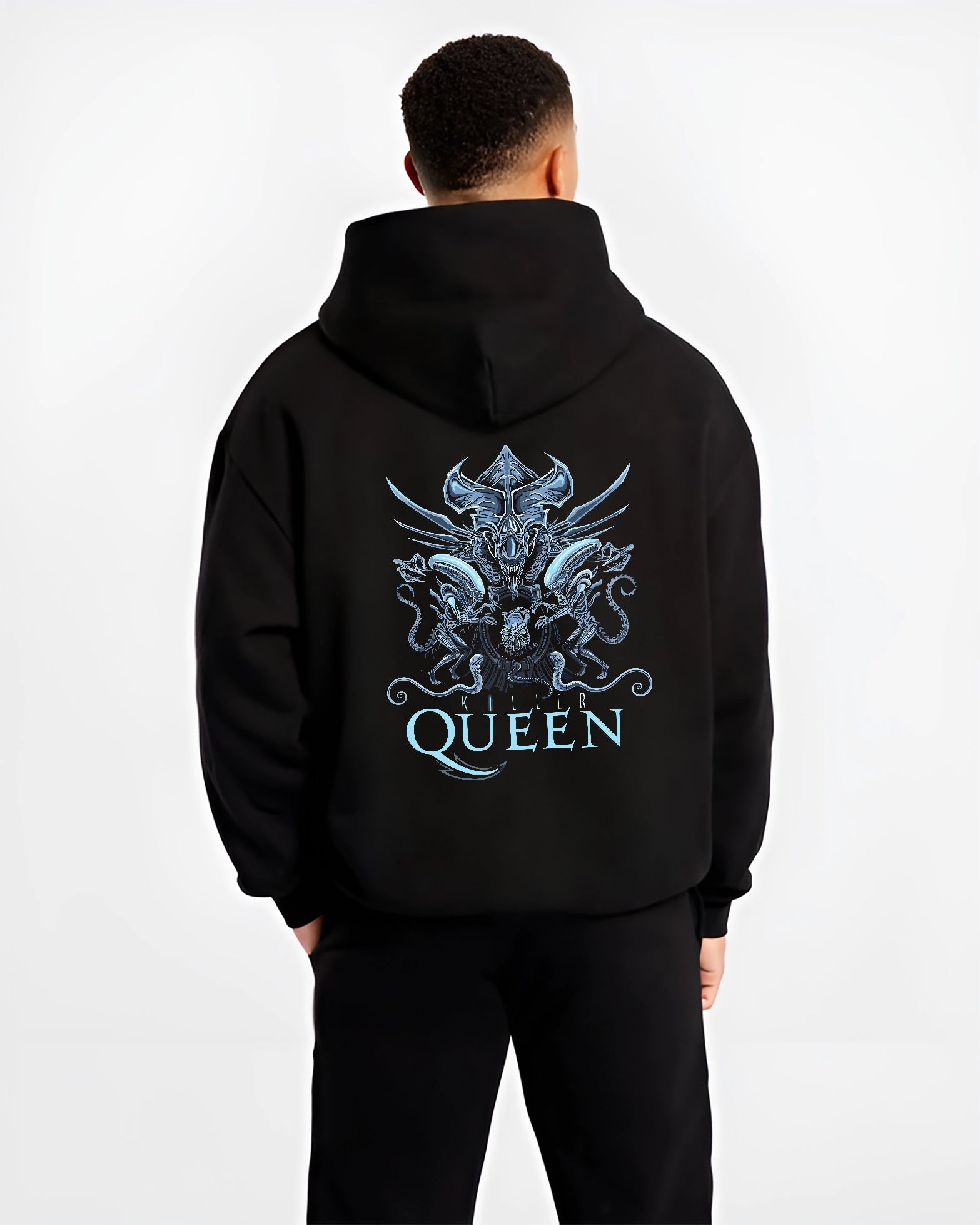 Black hoodie on male model, back view, Alien Xenomorph Queen “Killer Queen” retro sci-fi graphic with ornate biomechanical motifs and blue tones.