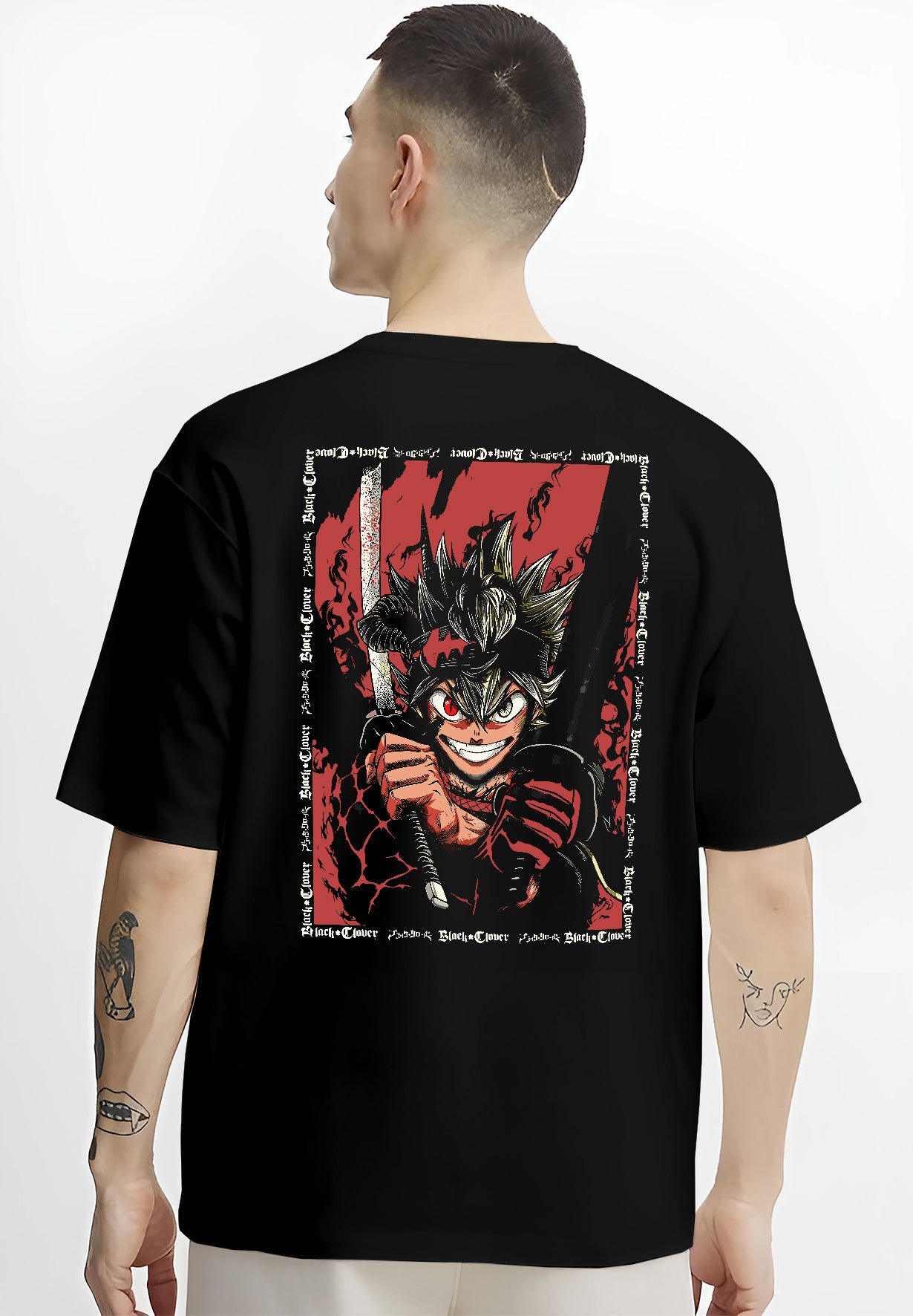 Black T-shirt worn by a male model, back view, featuring Asta Black Clover anime poster inspired shonen battle design with sword raised and fiery manga red aura.