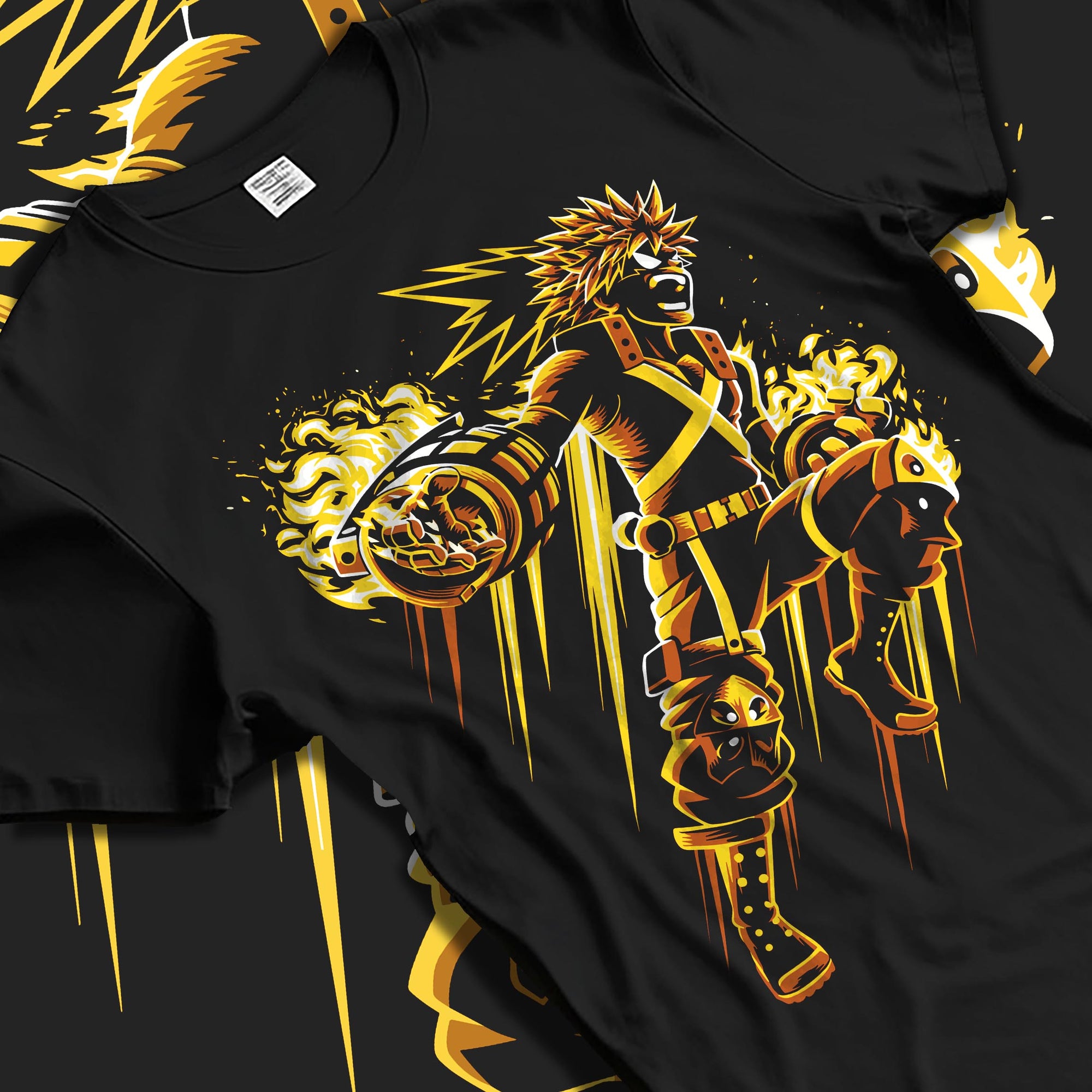Black T-shirt laid flat with soft folds, featuring Bakugo anime poster inspired graphic with explosive gauntlets and orange flame trails.