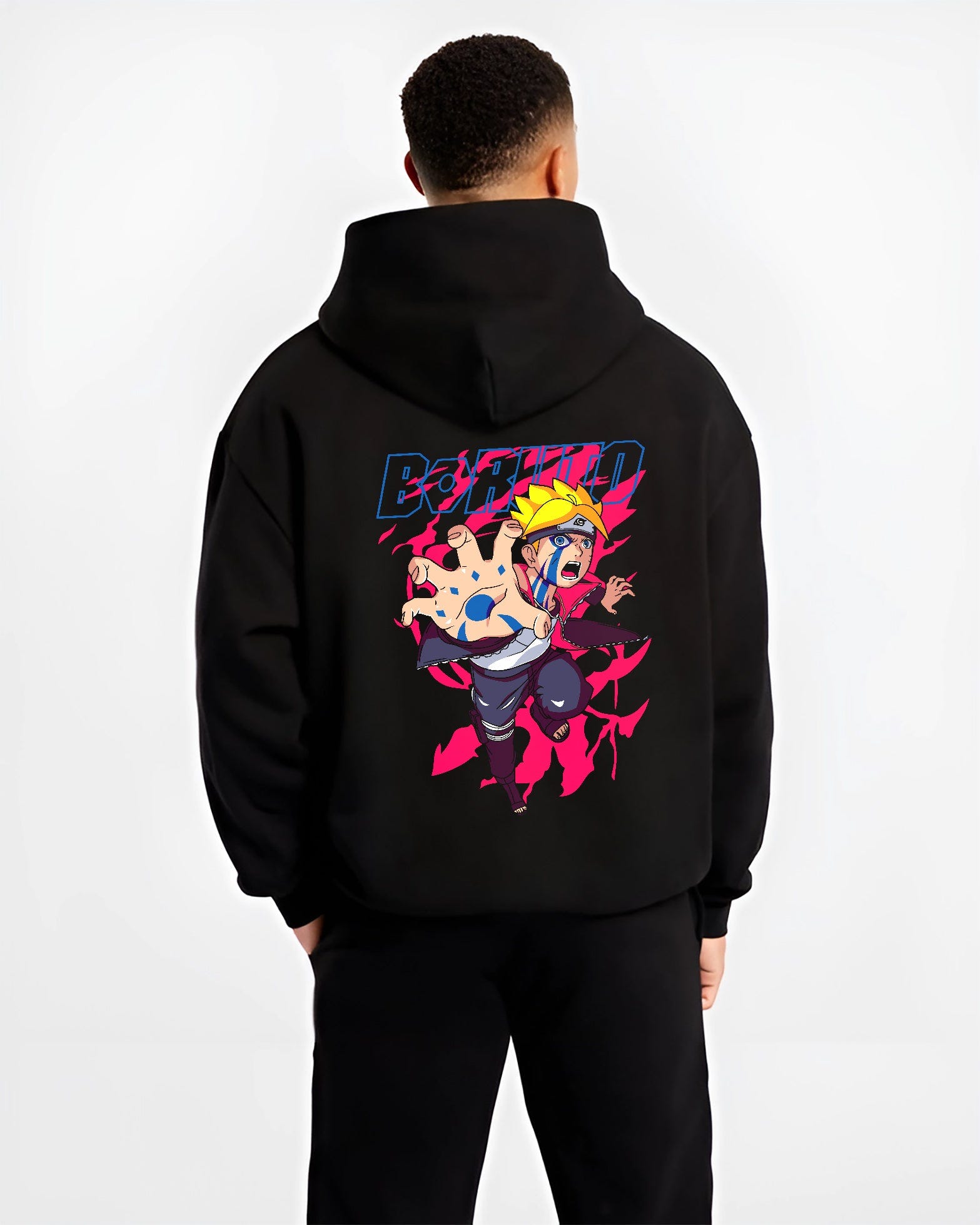 Black hoodie on male model, back view, featuring Boruto shonen battle graphic with blue Karma streaks and vivid neon pink aura.