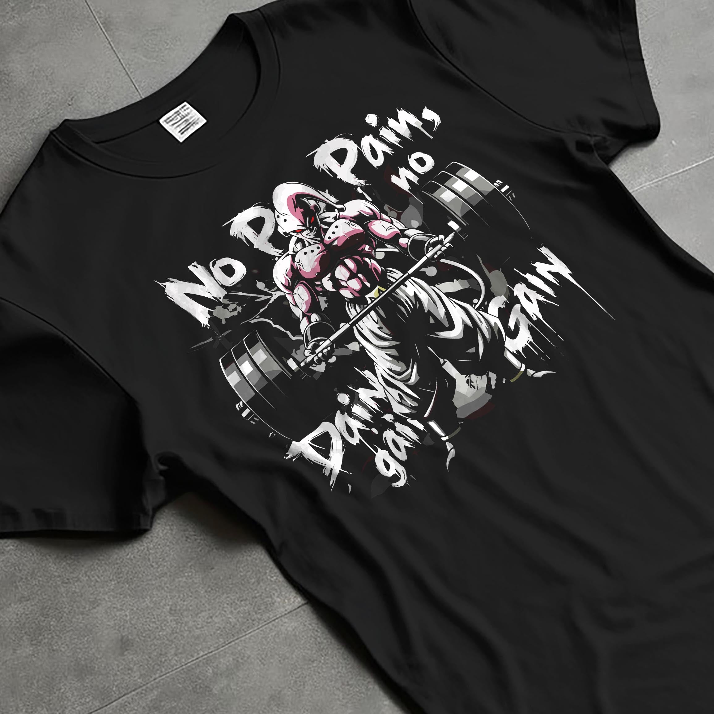 Black T-shirt laid flat with natural fabric folds, featuring Dragon Ball Majin Buu anime poster inspired workout artwork with barbell and motivational “No Pain No Gain” slogan.