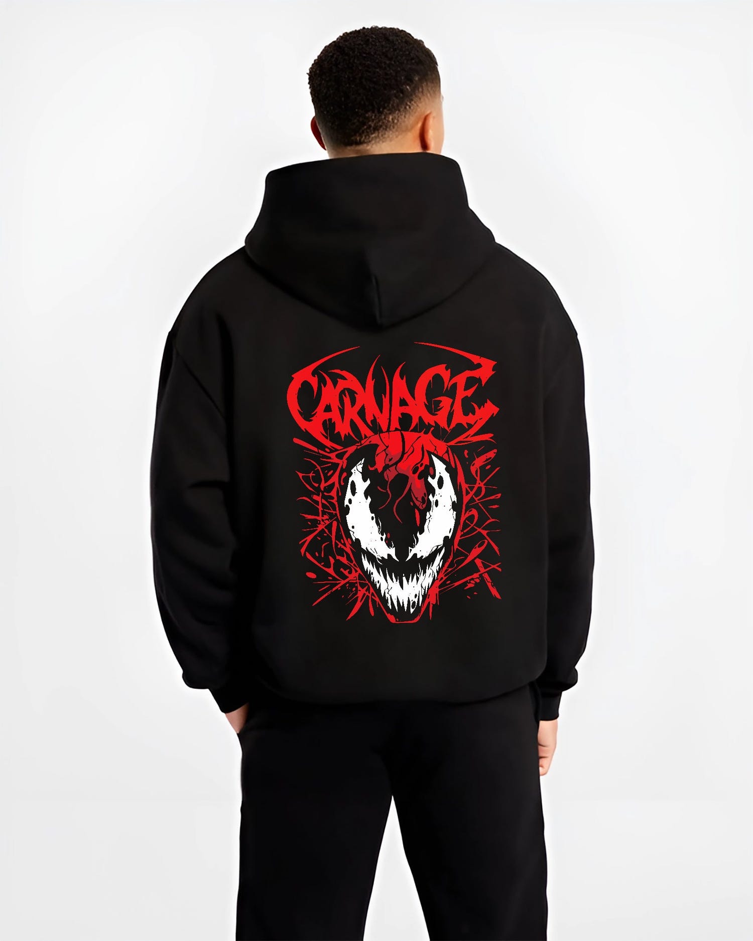 Black hoodie on male model, back view, Carnage comic villain mask with red symbiote swirls and distressed graffiti logo.