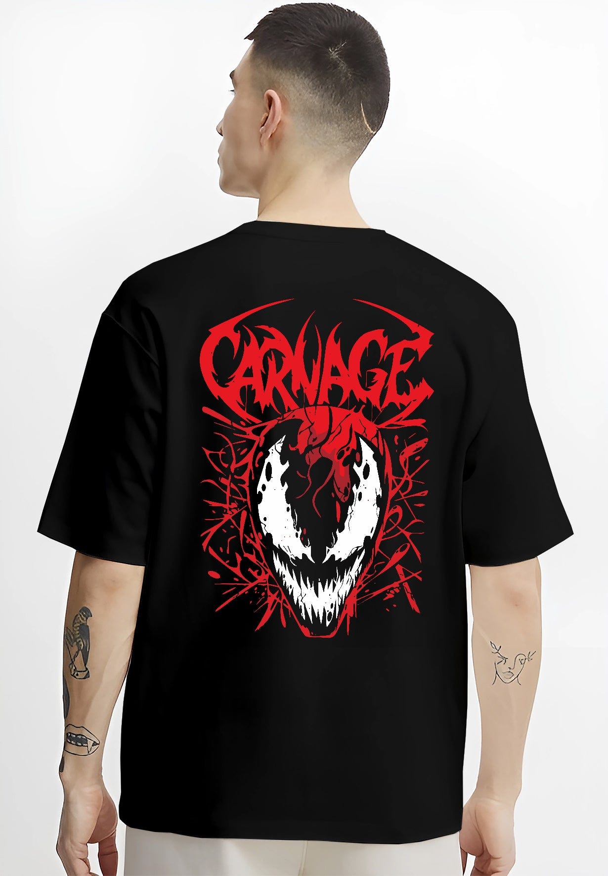 Black T-shirt on male model, back view, Carnage villain mask graphic with red symbiote tendrils and sharp graffiti lettering.