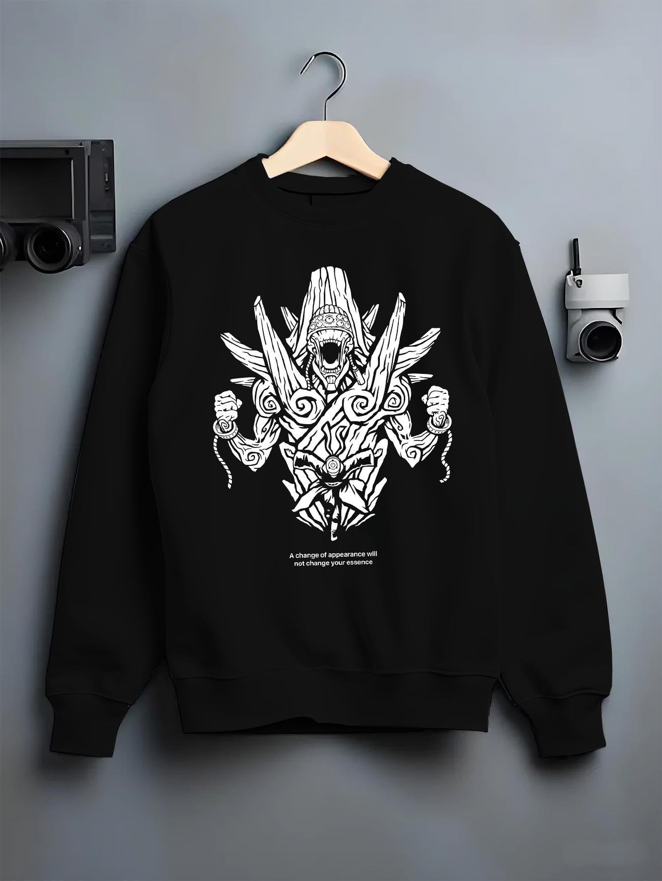 Black crewneck sweatshirt on hanger against grey wall, featuring dark manga panel demon guardian shrine line-art with swirling aura details.