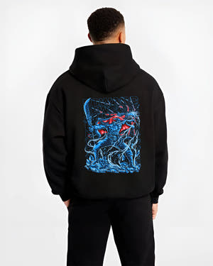 Black hoodie on male model, back view, Edward Newgate shonen battle graphic with quake effects, blue render and striking red cape.