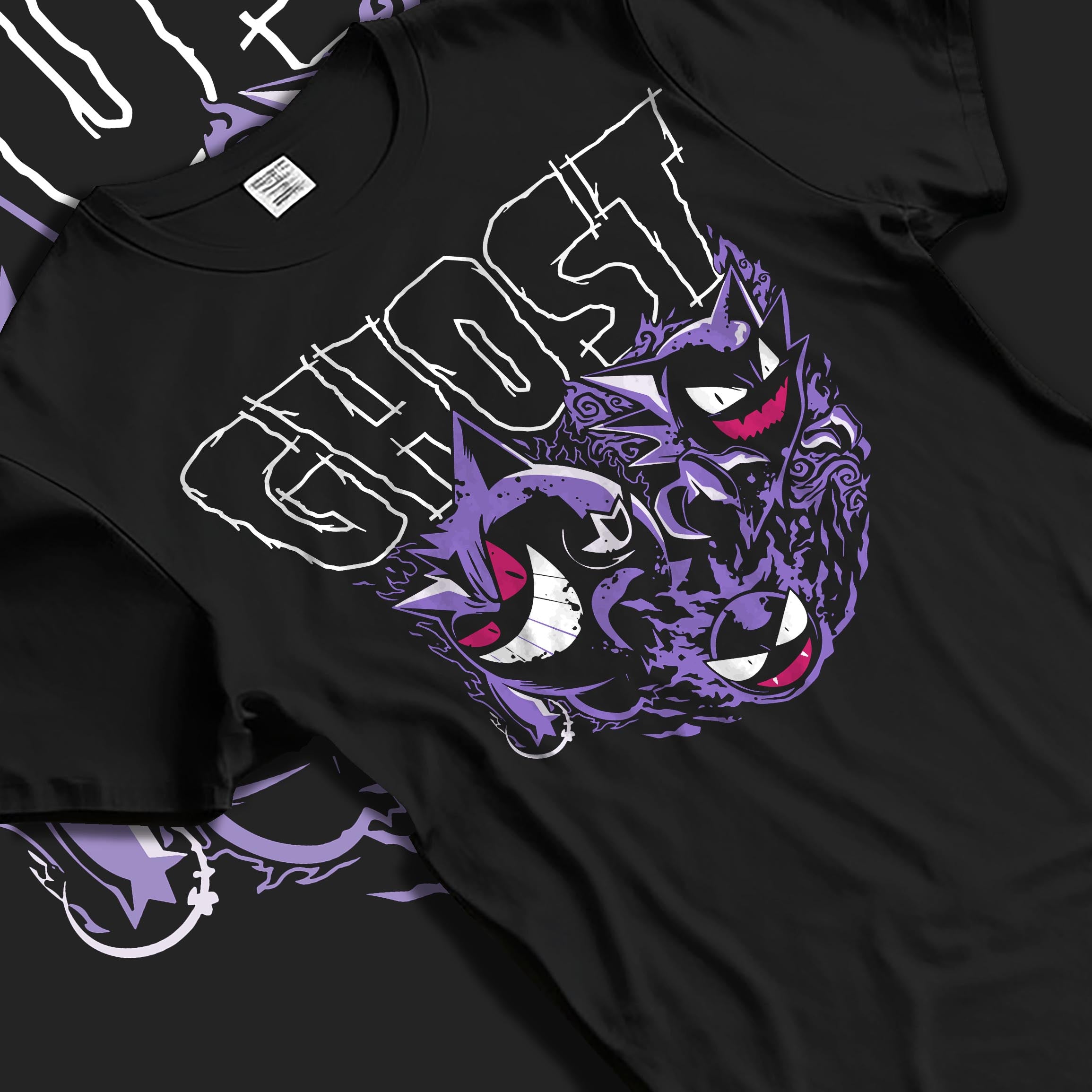 Black T-shirt laid flat with natural folds, featuring Gengar, Haunter, Gastly retro game graphic, “GHOST” title, and purple aura.