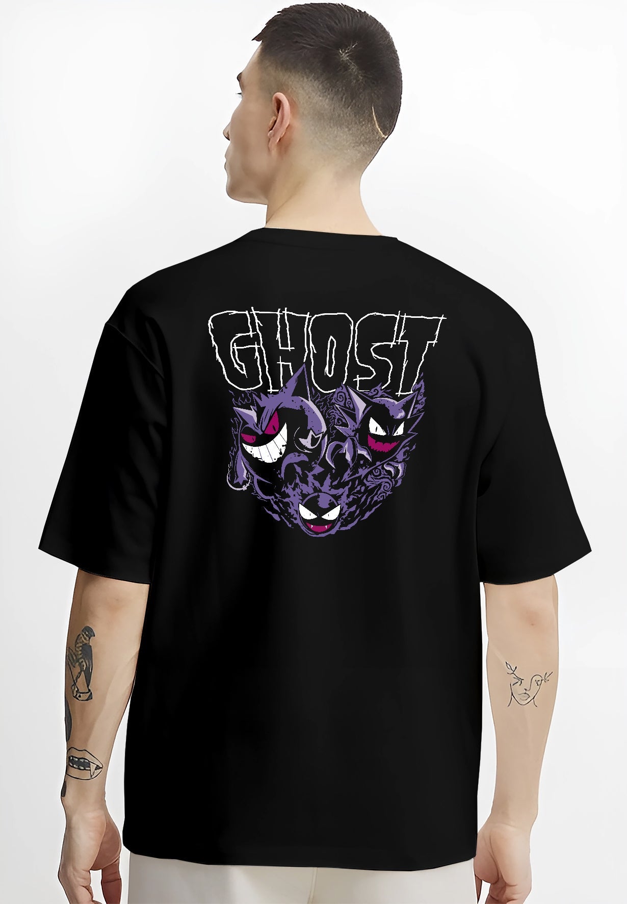 Black T-shirt on male model, back view, featuring Gengar, Haunter, Gastly retro game graphic with “GHOST” lettering and purple aura.