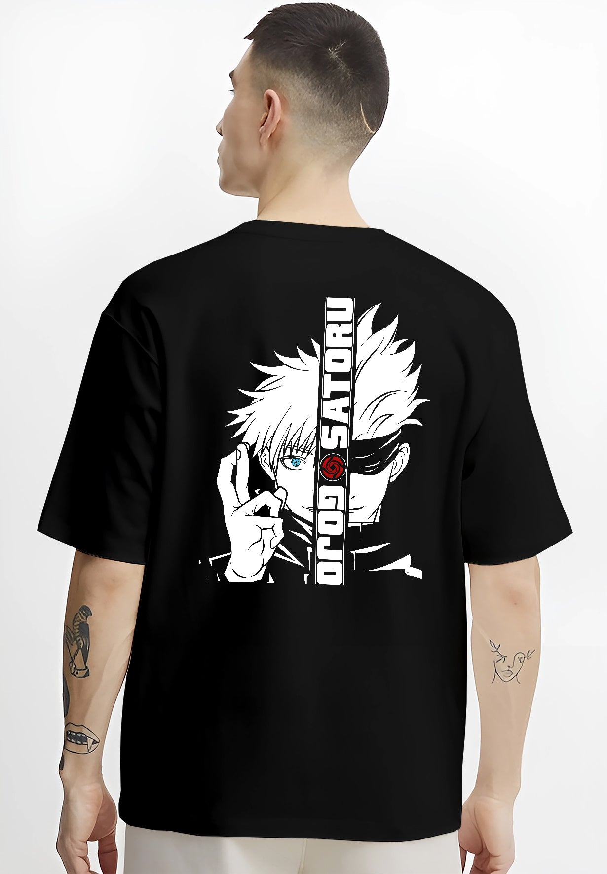 Black T-shirt on male model, back view, featuring Gojo Satoru split portrait Japanese animation streetwear graphic with striking blue eye.