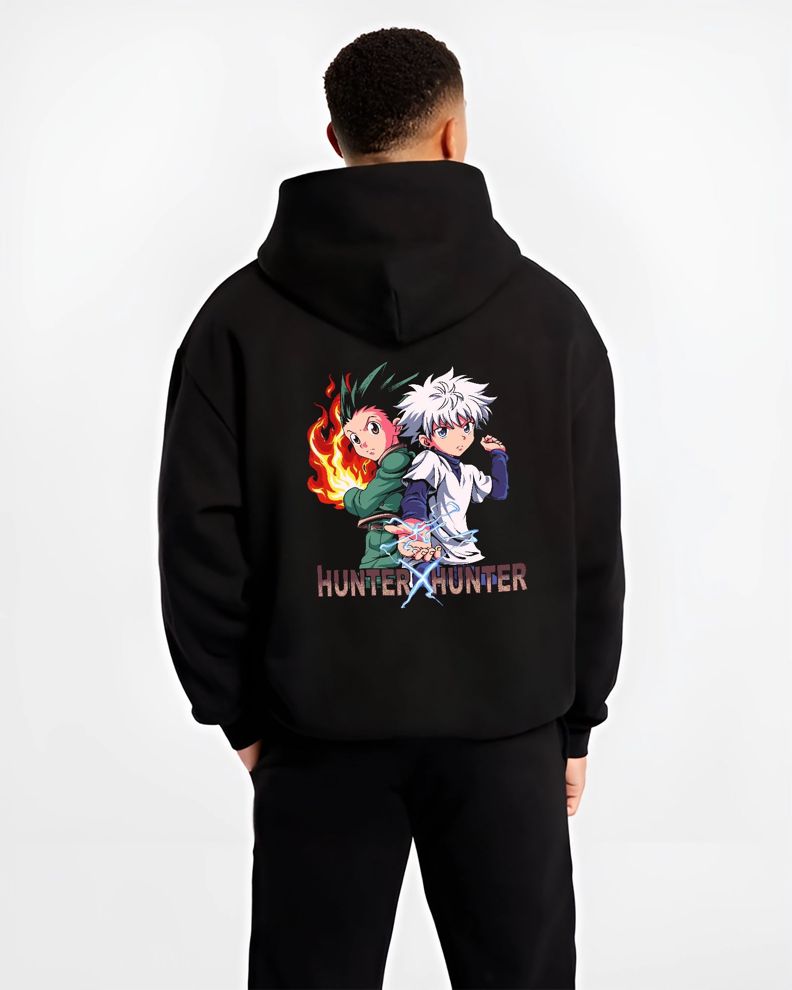 Black hoodie on male model, back view, Hunter x Hunter Gon and Killua anime poster design with pixel art flames and lightning.