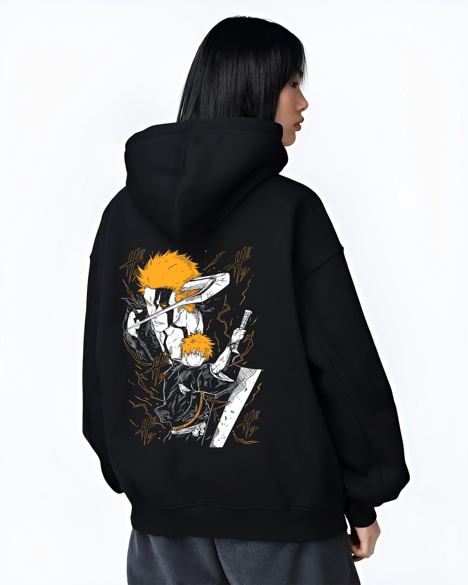 Black hoodie worn by a female model, back view, featuring Ichigo Bleach anime poster inspired design with detailed retro manga artwork and fiery battle aura.